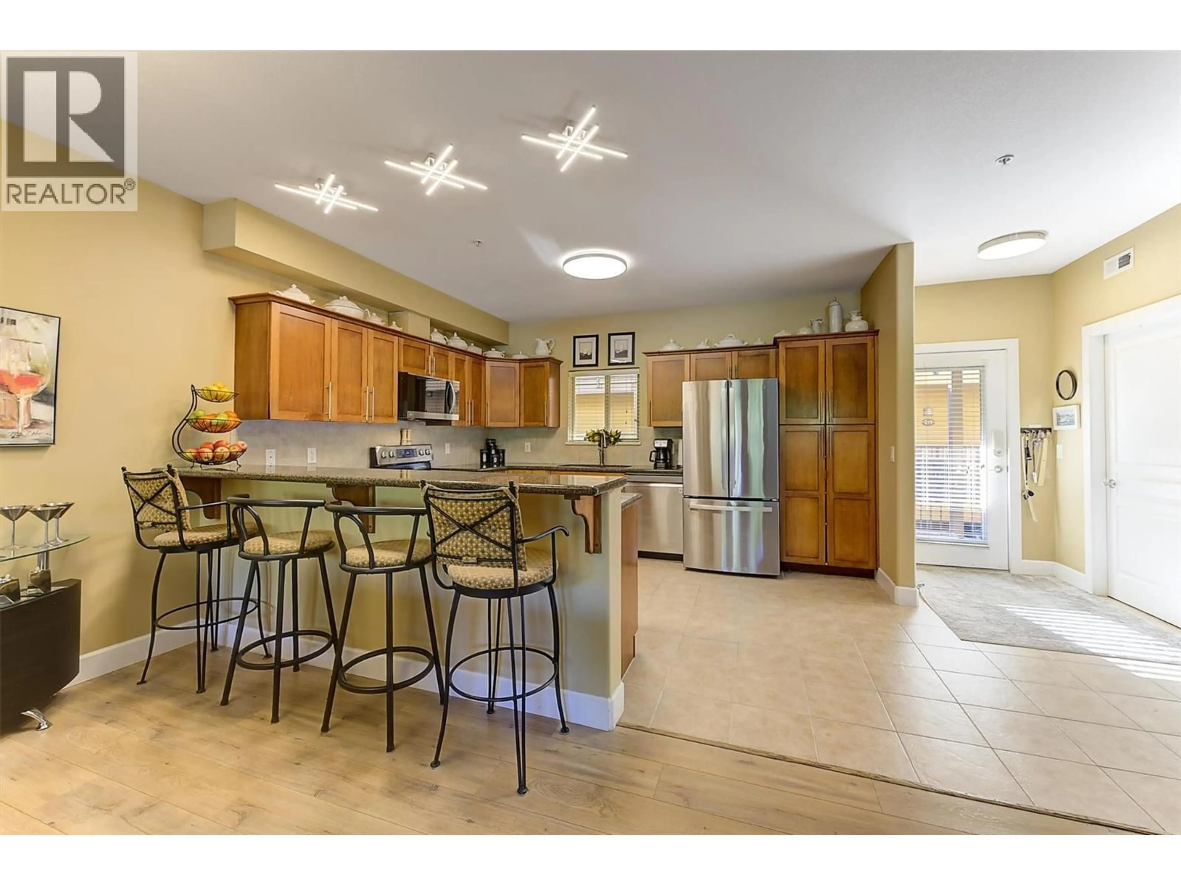 Open concept kitchen, ceramic/tile floor for 236 - 3996 BEACH AVENUE, Peachland British Columbia V0H1X1