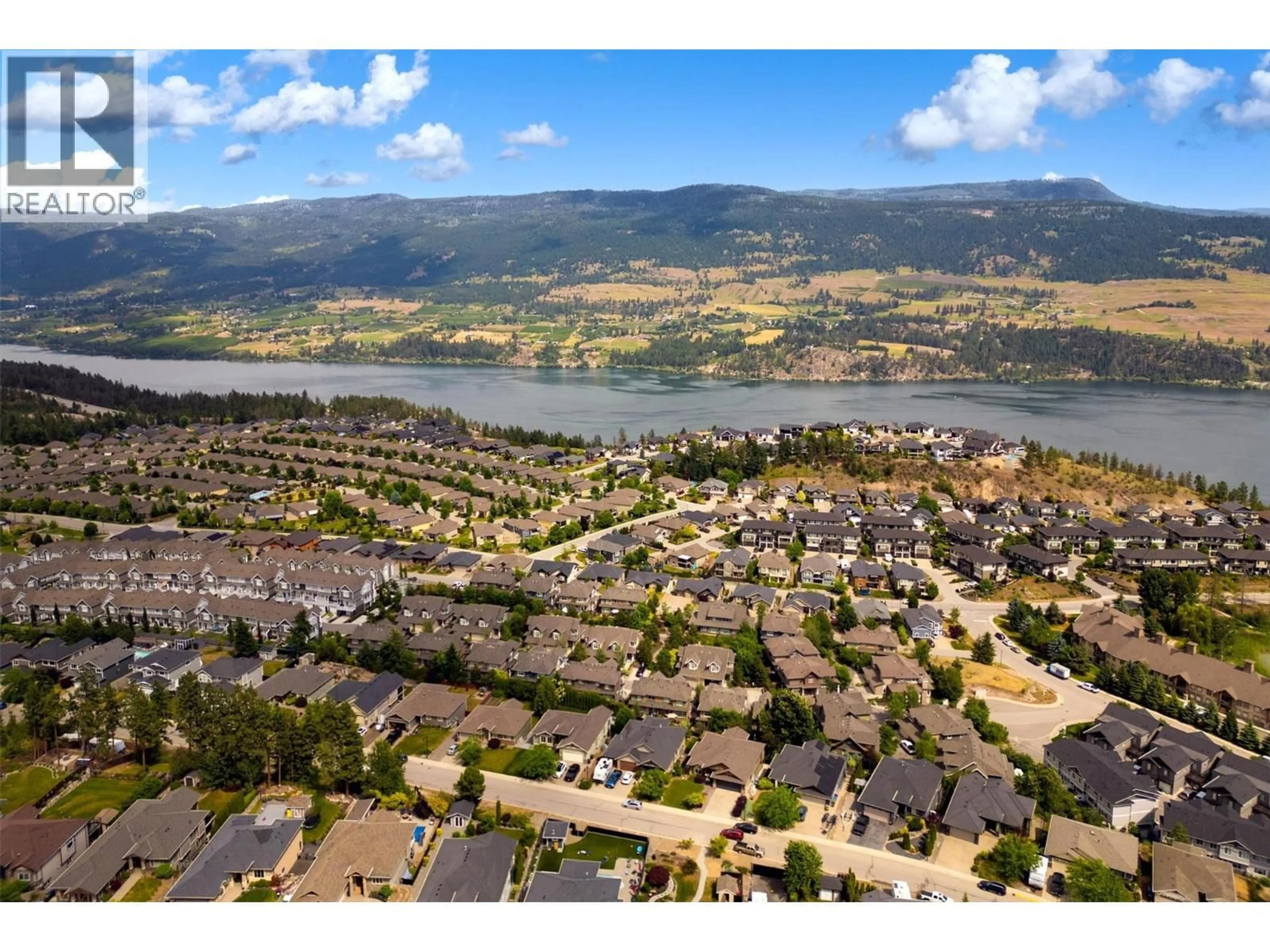 A pic from outside/outdoor area/front of a property/back of a property/a pic from drone, water/lake/river/ocean view for 58 - 12850 STILLWATER COURT, Lake Country British Columbia V4V2S9
