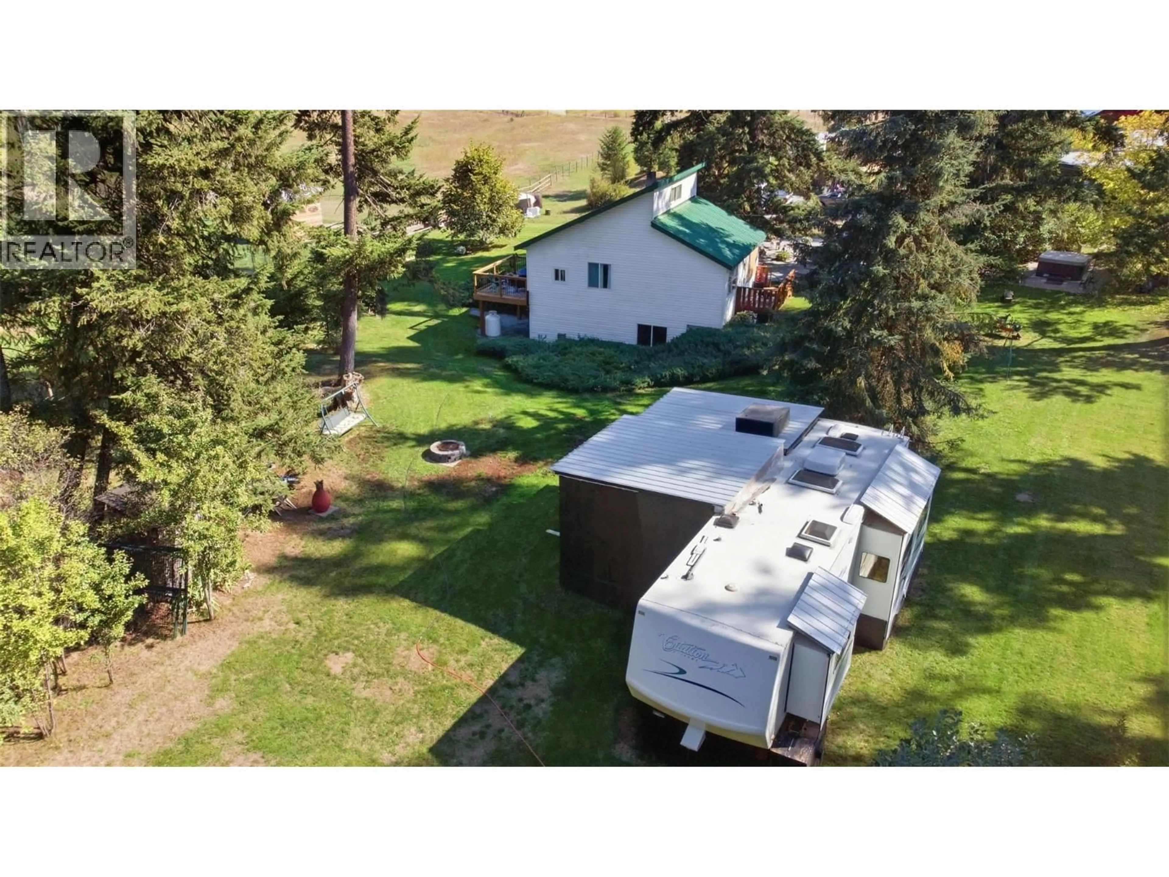 A pic from outside/outdoor area/front of a property/back of a property/a pic from drone, unknown for 1385 6 HIGHWAY, Cherryville British Columbia V0E2G1
