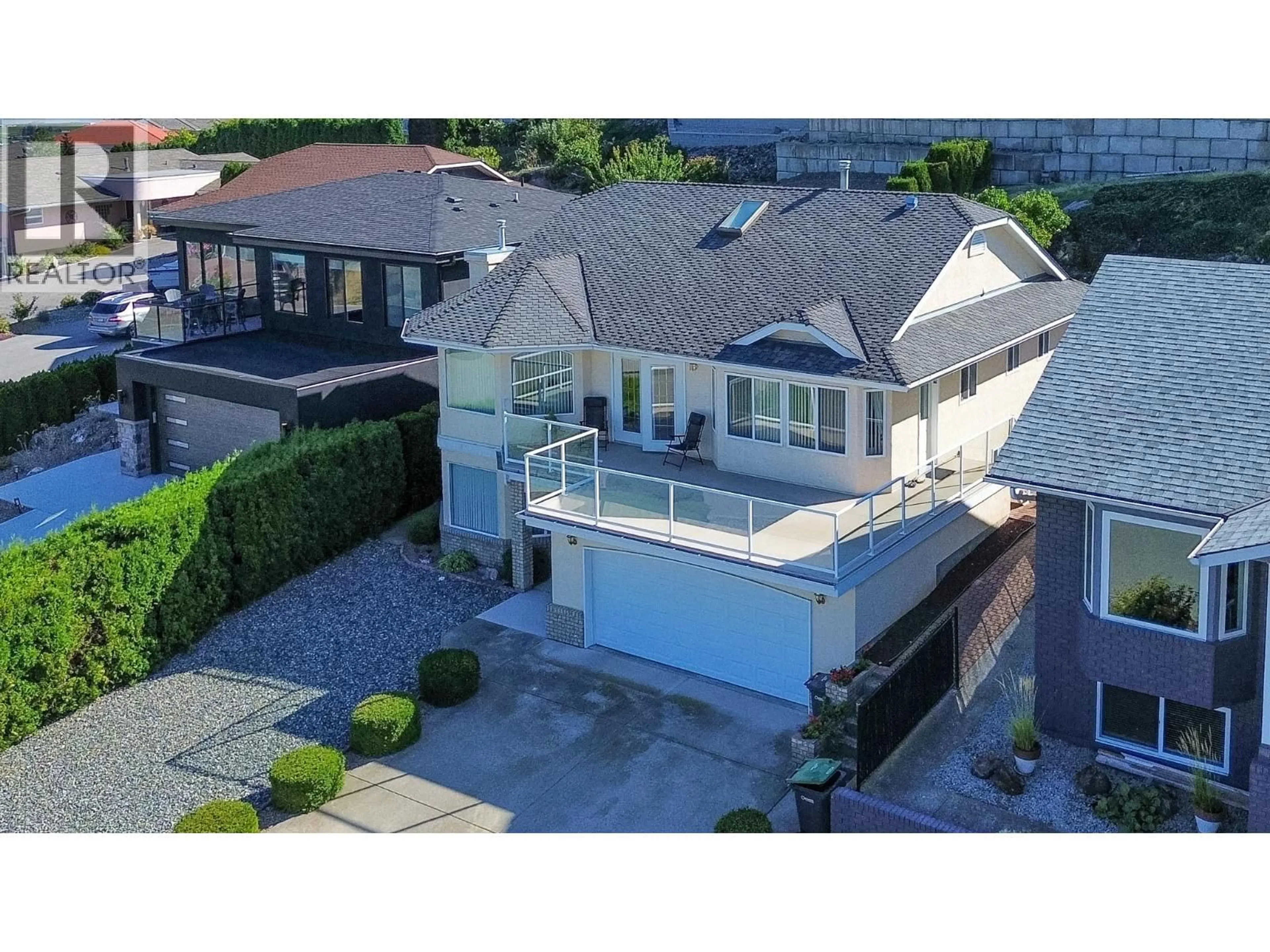 A pic from outside/outdoor area/front of a property/back of a property/a pic from drone, street for 11708 QUAIL RIDGE PLACE, Osoyoos British Columbia V0H1V4
