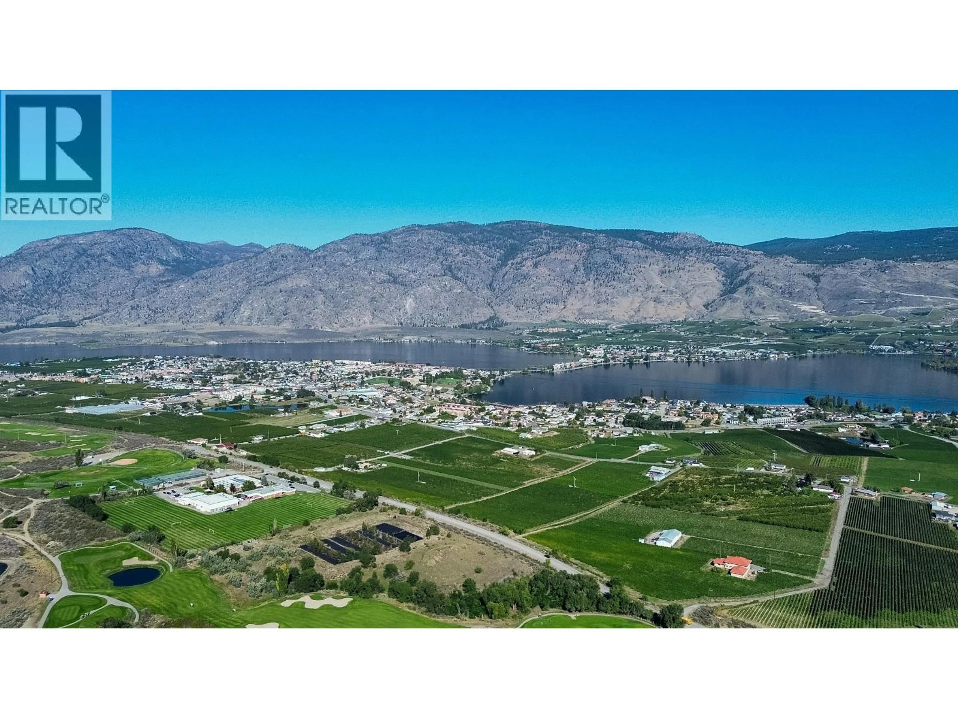 A pic from outside/outdoor area/front of a property/back of a property/a pic from drone, water/lake/river/ocean view for 11708 QUAIL RIDGE PLACE, Osoyoos British Columbia V0H1V4