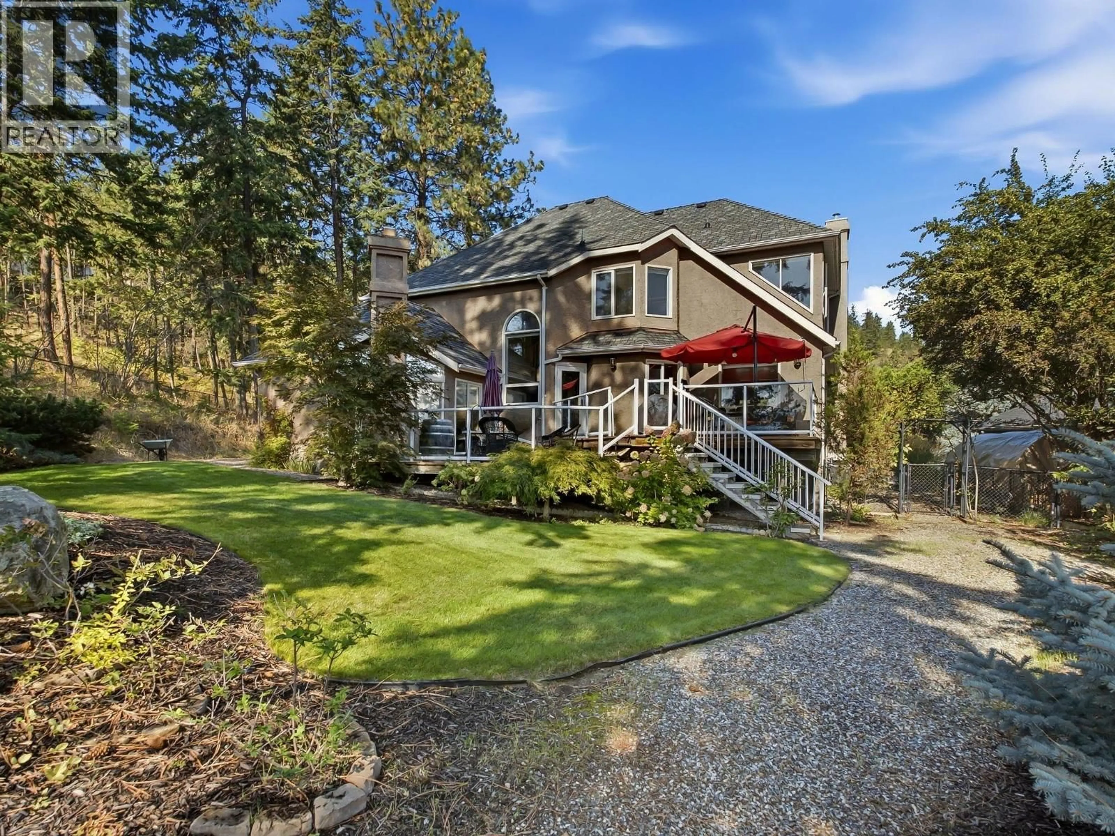 A pic from outside/outdoor area/front of a property/back of a property/a pic from drone, unknown for 764 CASSIAR PLACE, Kelowna British Columbia V1V1M6