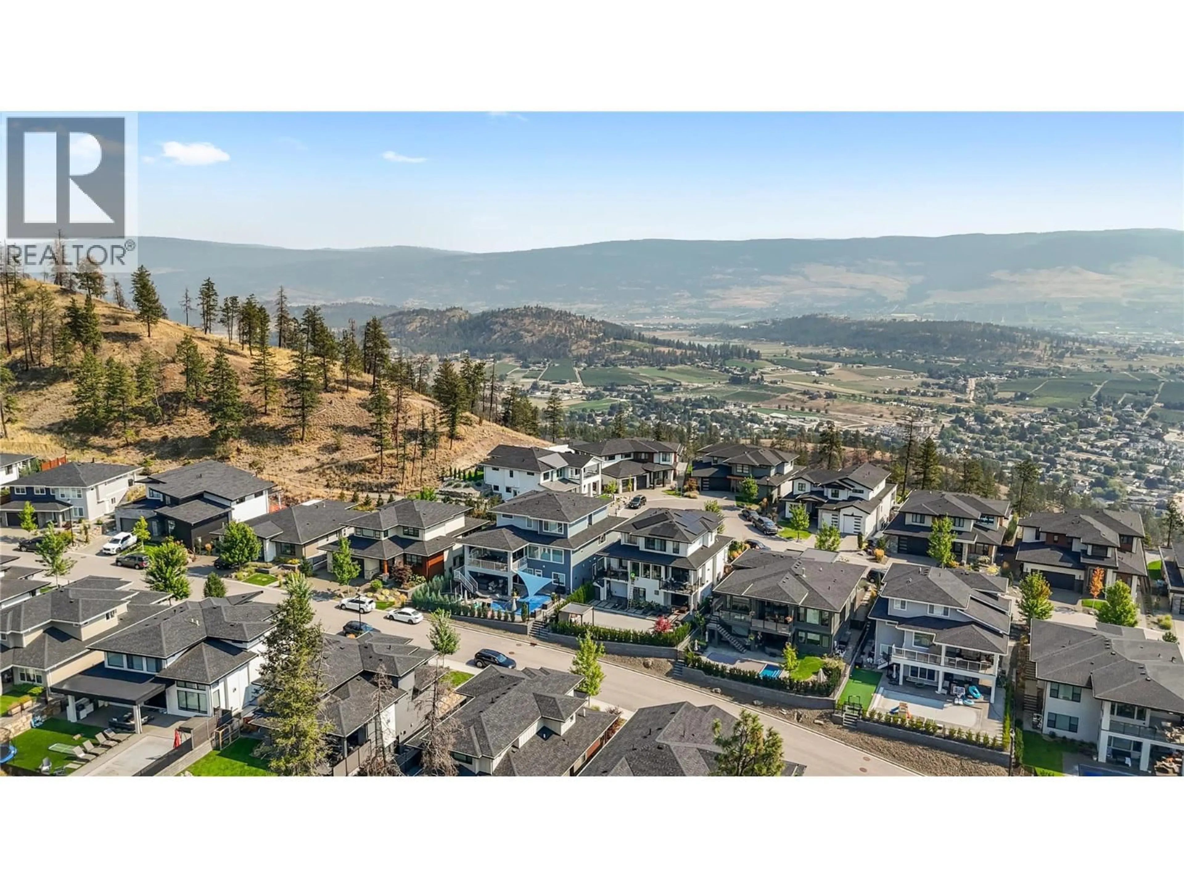 A pic from outside/outdoor area/front of a property/back of a property/a pic from drone, mountain view for 258 SUMMER WOOD DRIVE, Kelowna British Columbia V1V0C9
