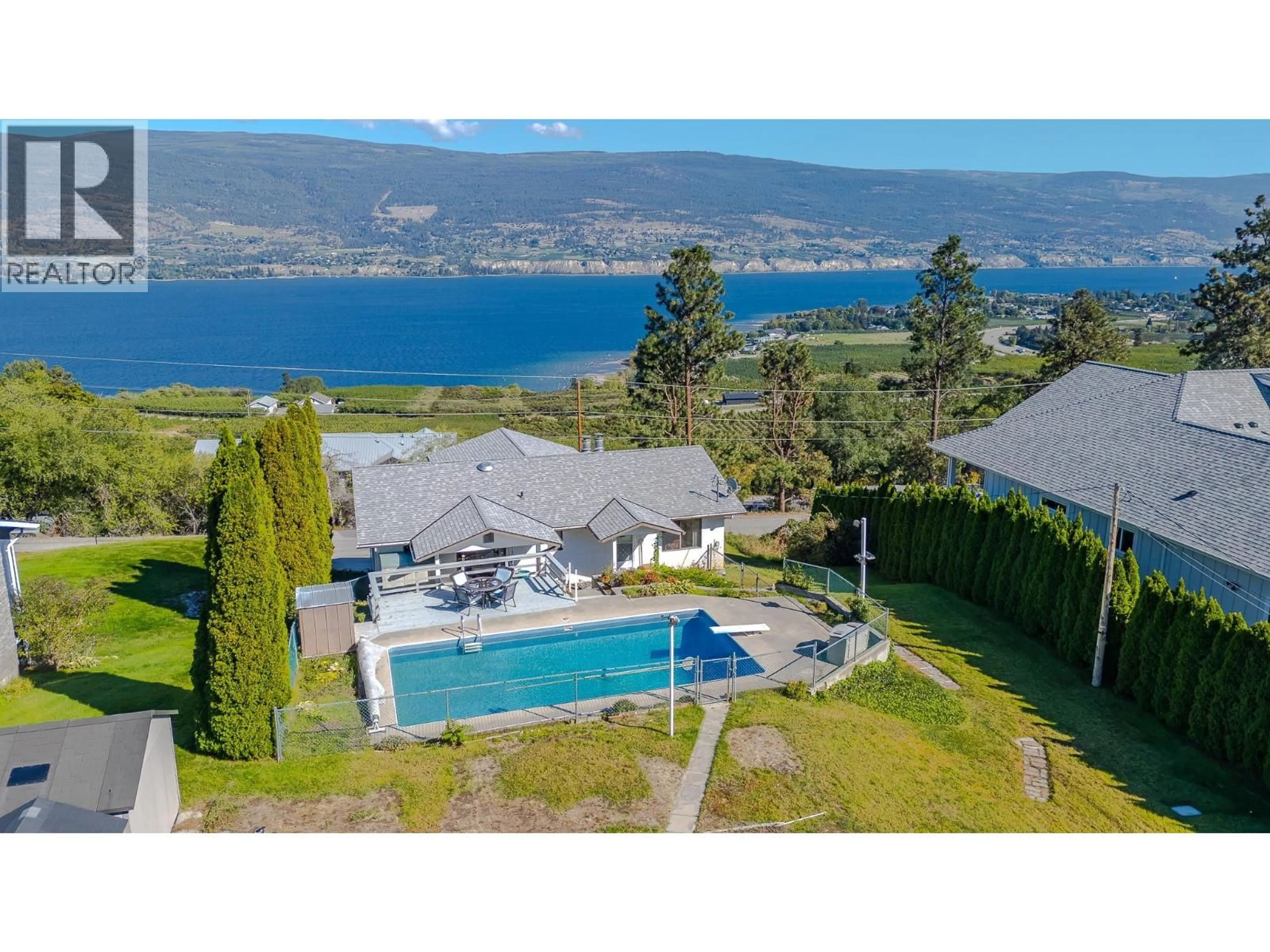 A pic from outside/outdoor area/front of a property/back of a property/a pic from drone, water/lake/river/ocean view for 8820 HAPPY VALLEY ROAD, Summerland British Columbia V0H1Z7