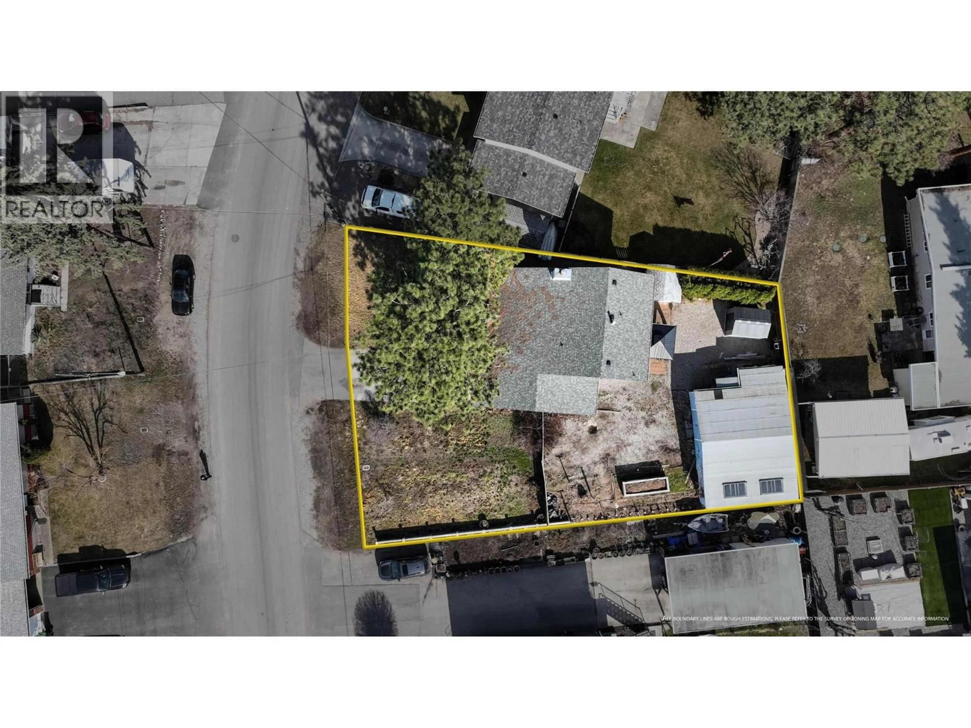 A pic from outside/outdoor area/front of a property/back of a property/a pic from drone, street for 255 CAMBIE ROAD, Kelowna British Columbia V1X3H9