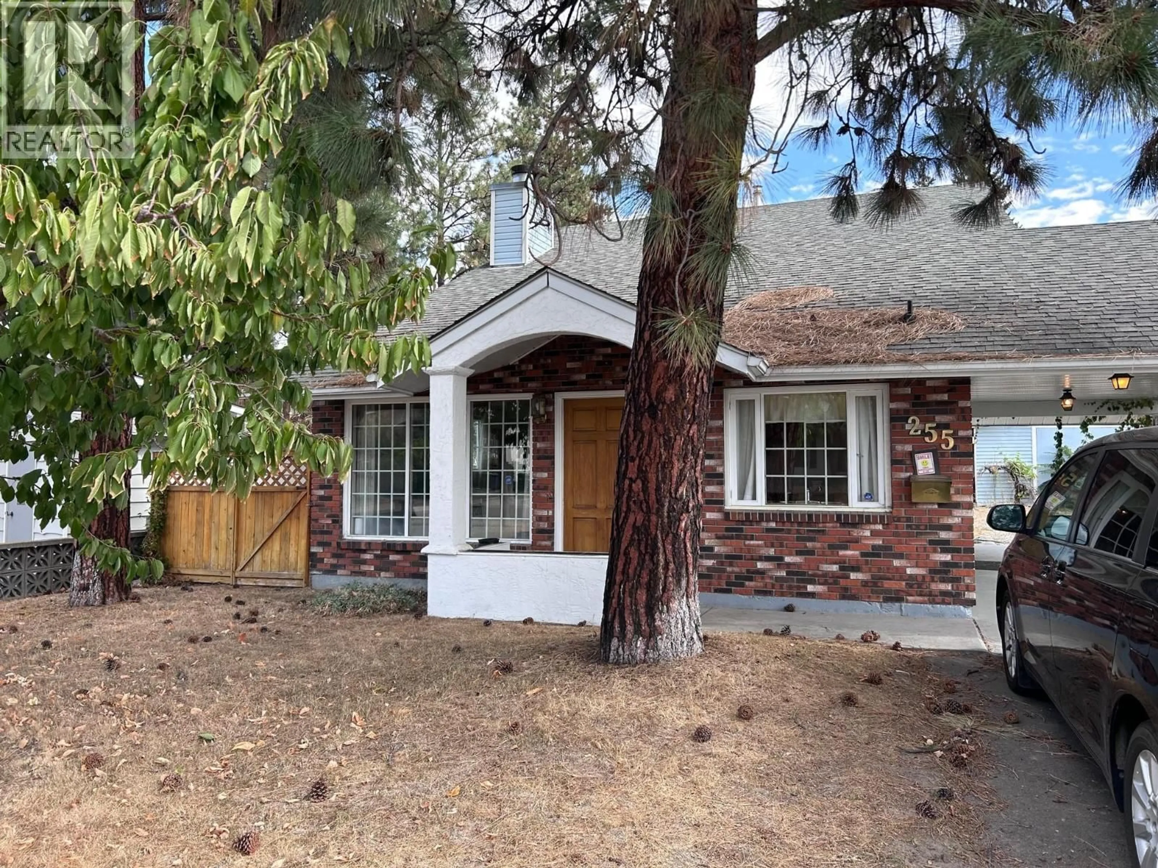 Home with brick exterior material, street for 255 CAMBIE ROAD, Kelowna British Columbia V1X3H9