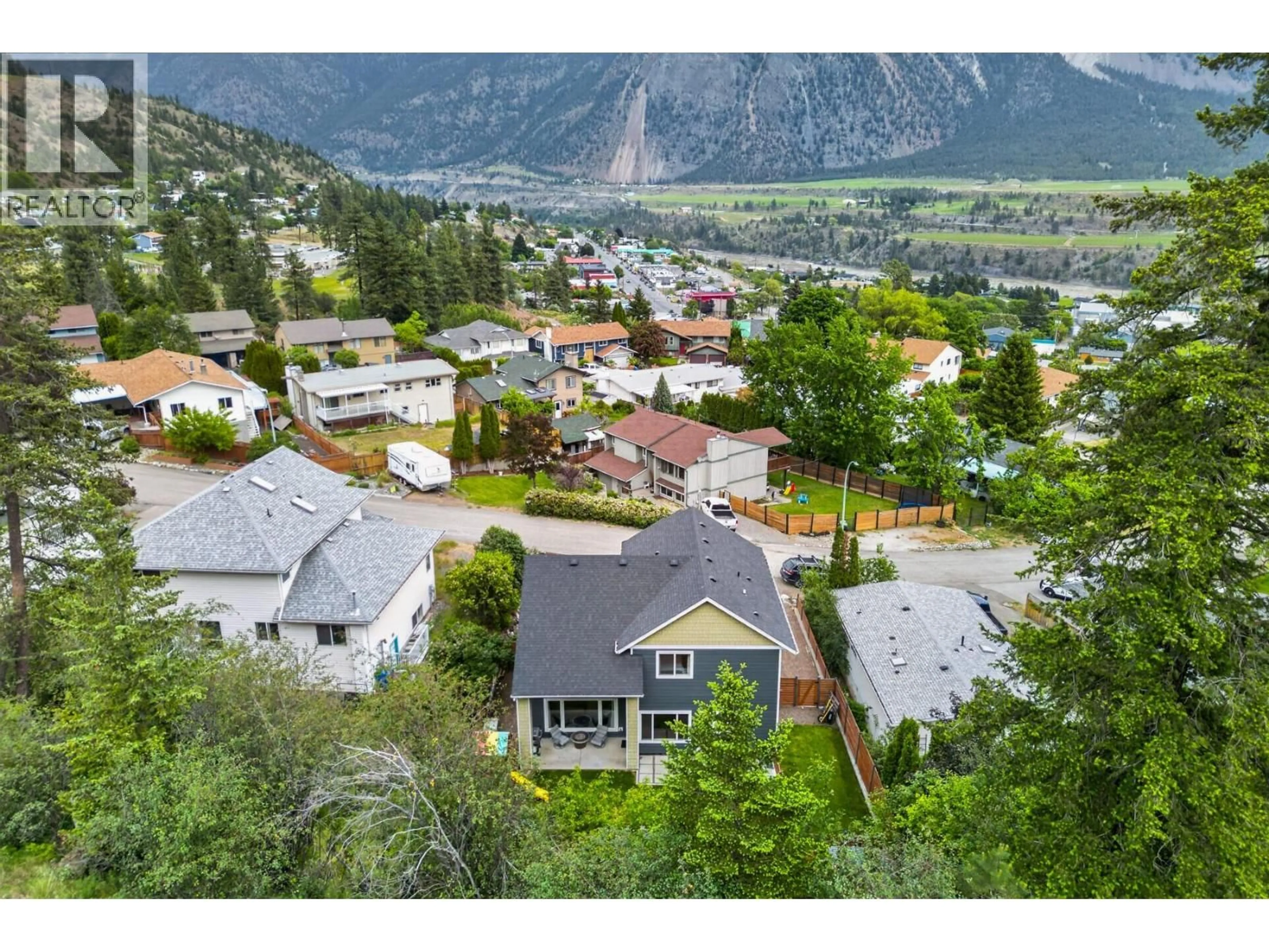 A pic from outside/outdoor area/front of a property/back of a property/a pic from drone, mountain view for 882 EAGLESON CRESCENT, Lillooet British Columbia V0K1V0