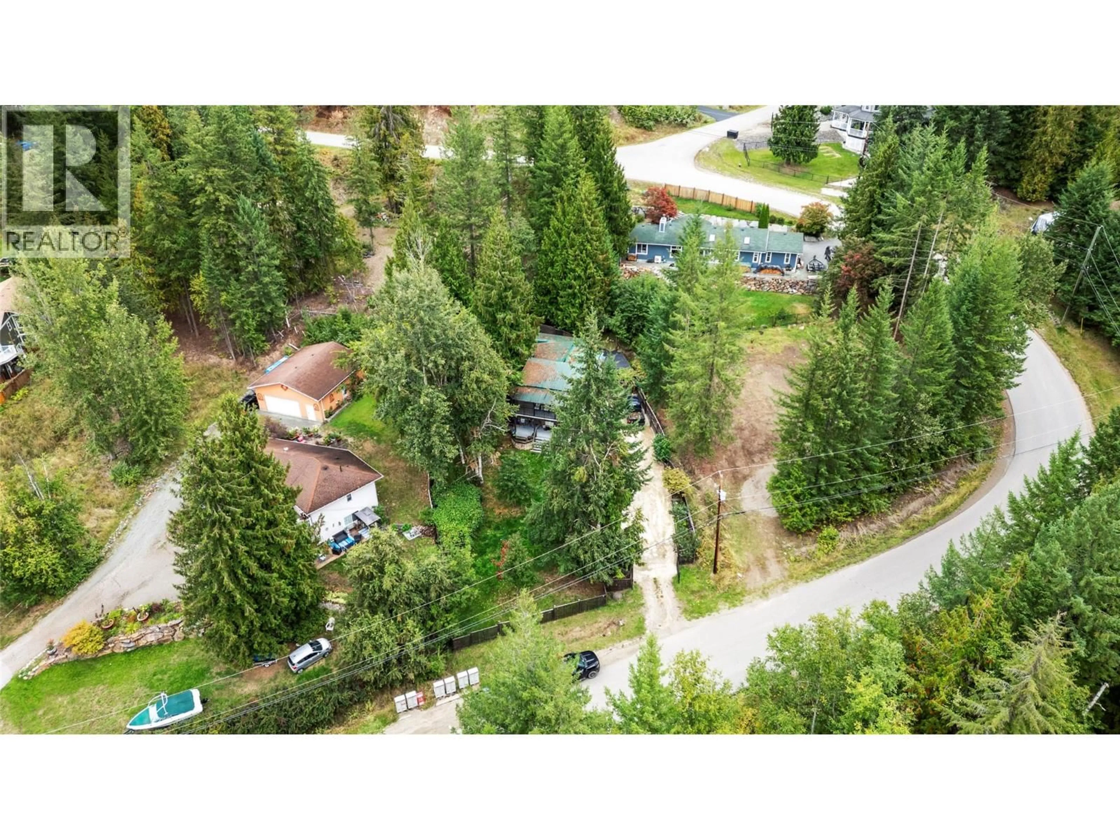 A pic from outside/outdoor area/front of a property/back of a property/a pic from drone, forest/trees view for 2675 FRASER ROAD, Anglemont British Columbia V0E1M8