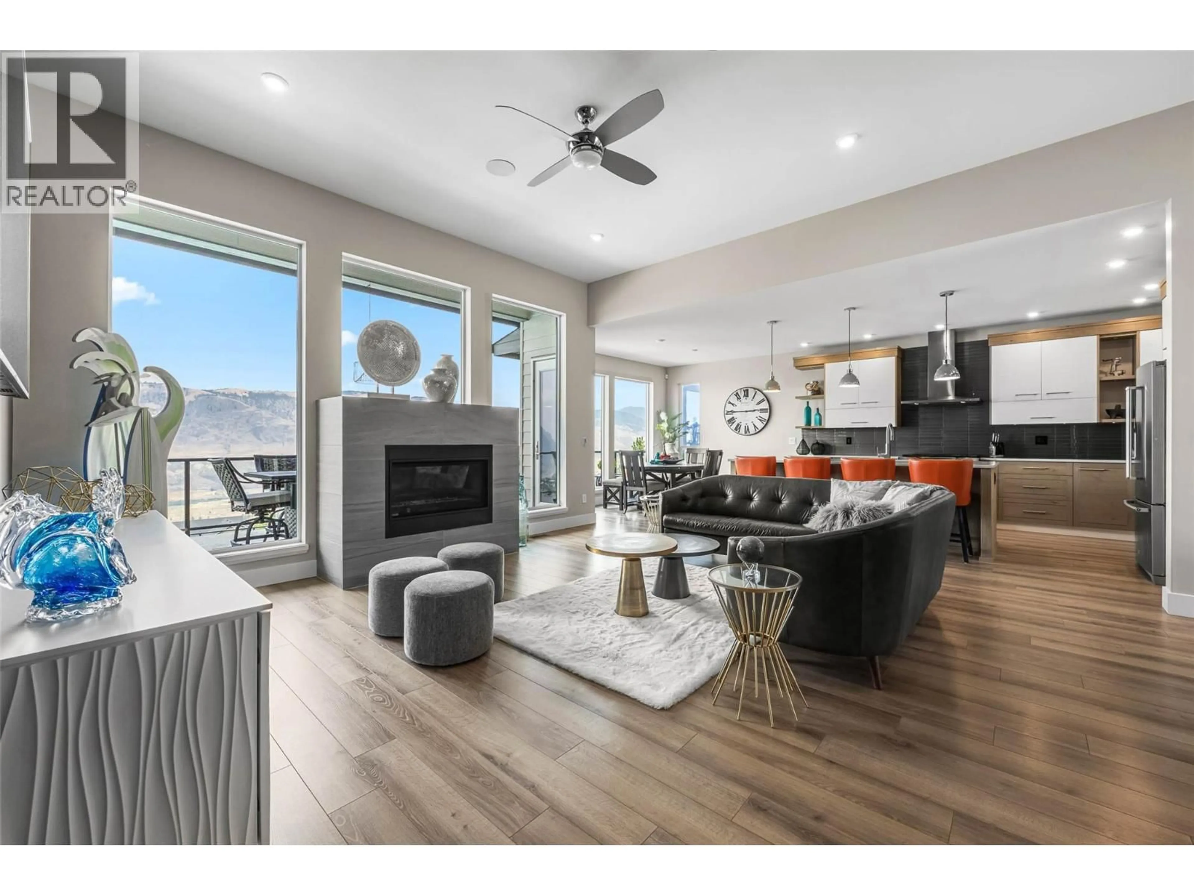 Living room with furniture, wood/laminate floor for 1766 GALORE PLACE, Kamloops British Columbia V2E0A7