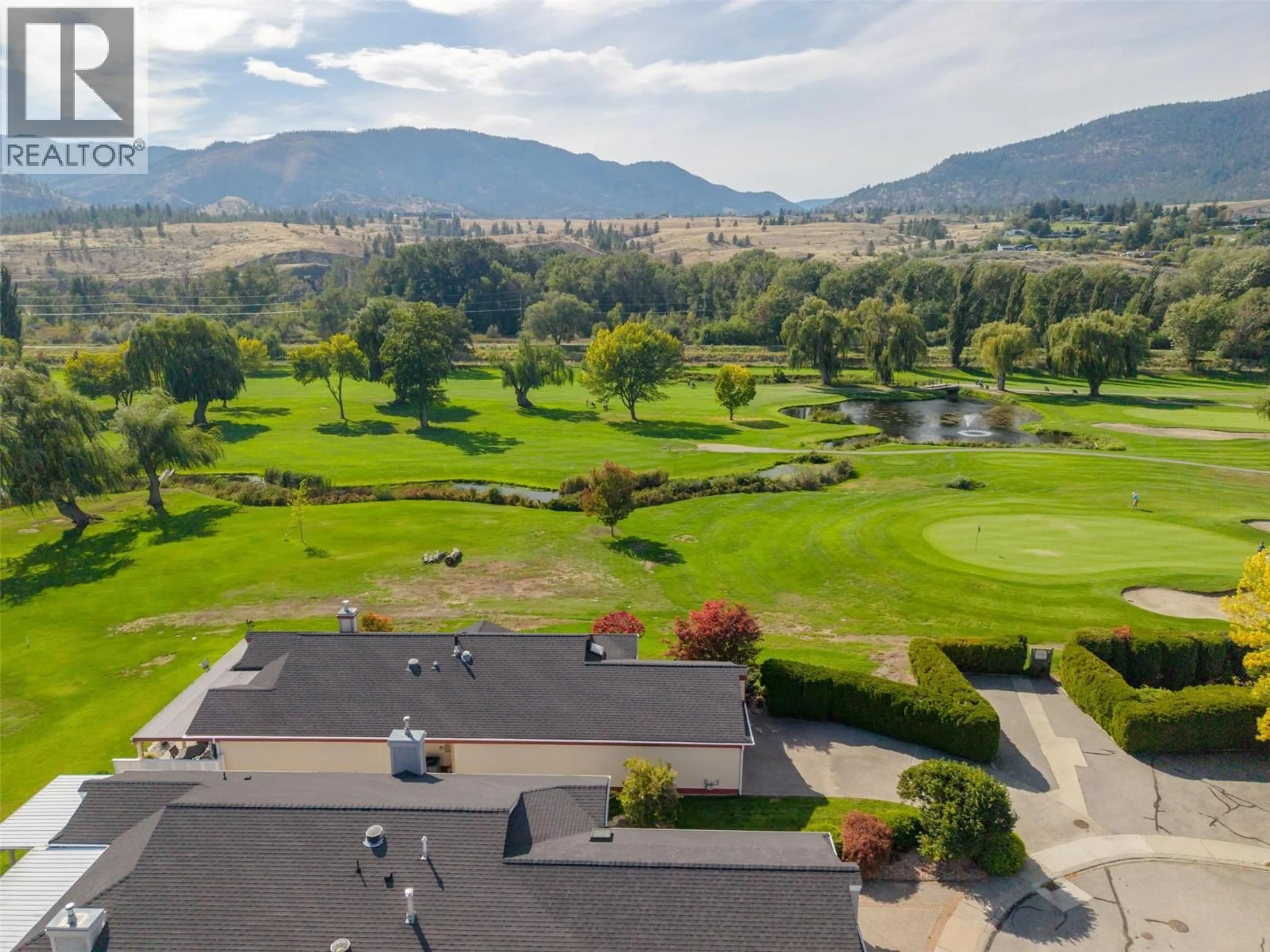 A pic from outside/outdoor area/front of a property/back of a property/a pic from drone, mountain view for 116 - 801 COMOX STREET, Penticton British Columbia V2A8G5
