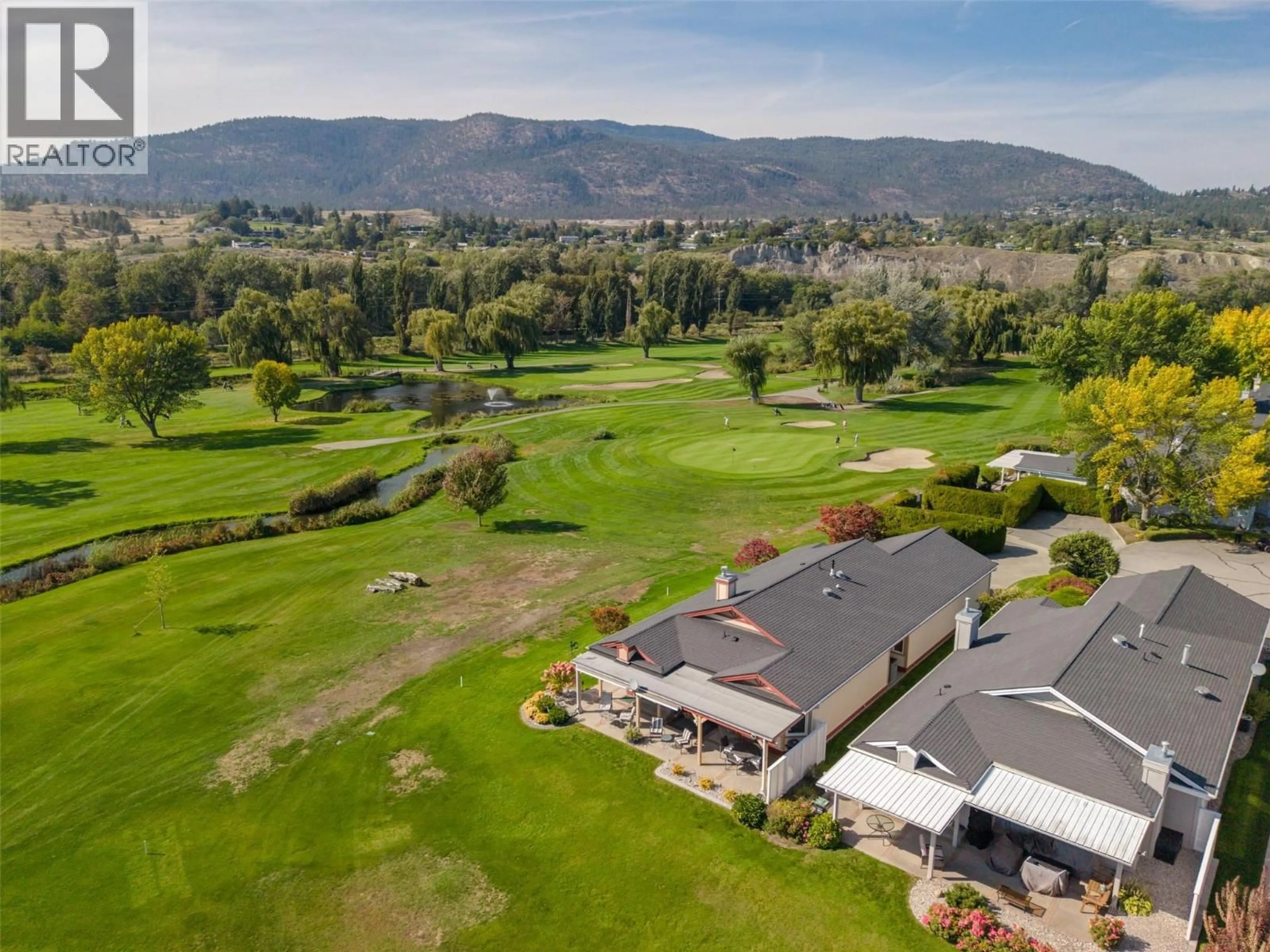 A pic from outside/outdoor area/front of a property/back of a property/a pic from drone, mountain view for 116 - 801 COMOX STREET, Penticton British Columbia V2A8G5