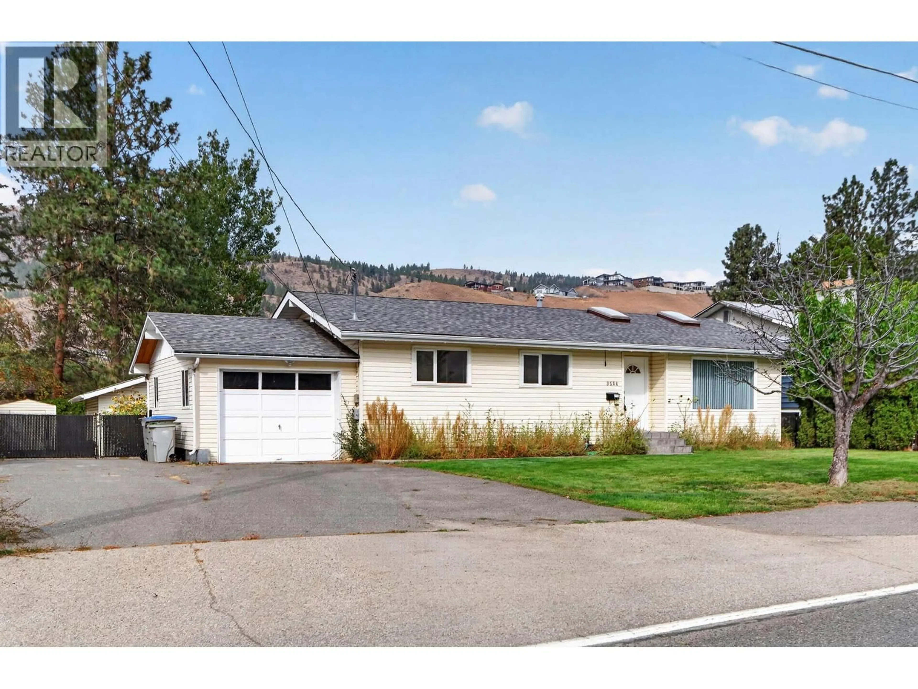 Home with vinyl exterior material, street for 3564 BANK ROAD, Kamloops British Columbia V2B7A6