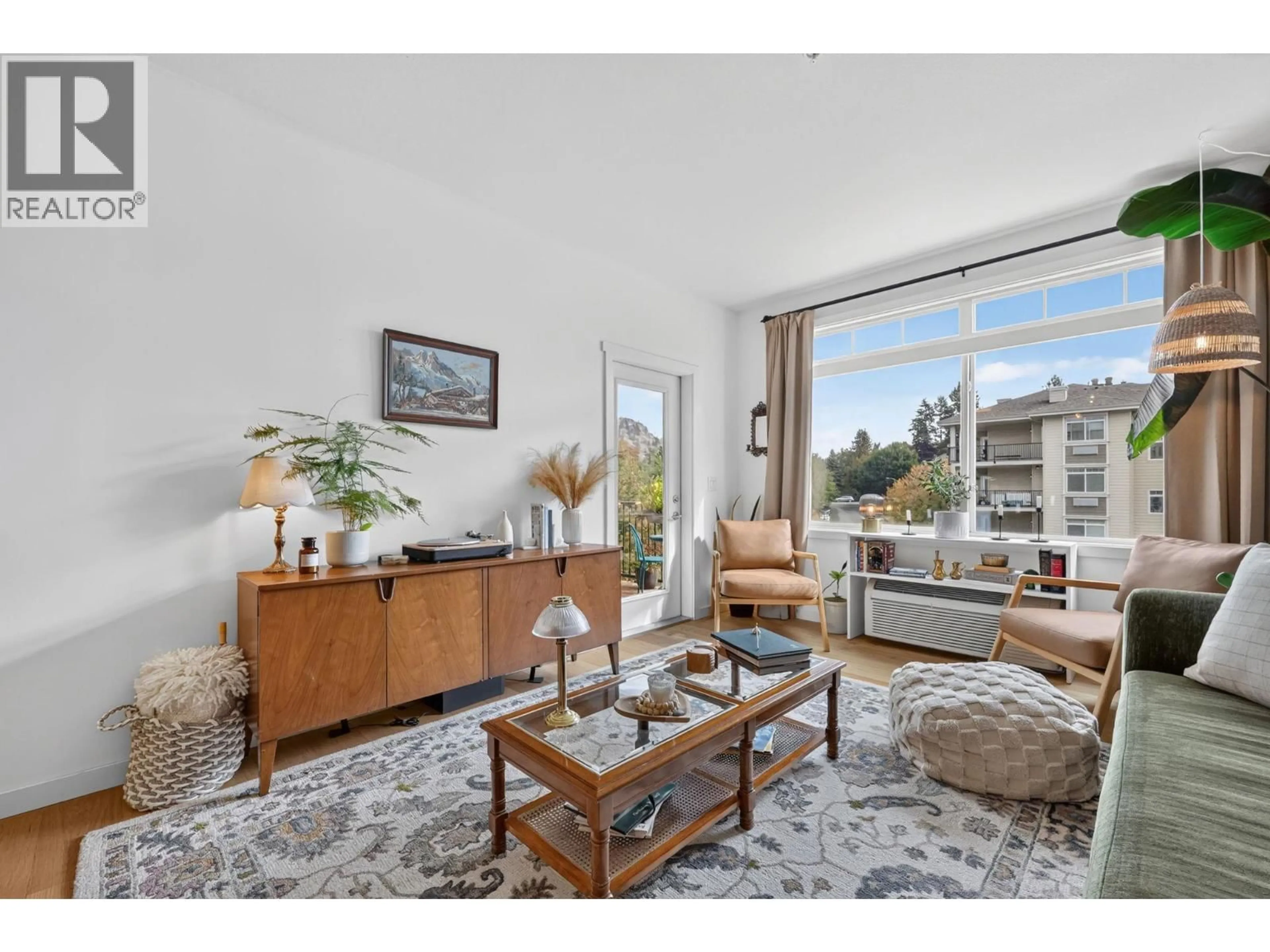 Living room with furniture, unknown for 302 - 1350 RIDGEWAY DRIVE, Kelowna British Columbia V1Y9T8