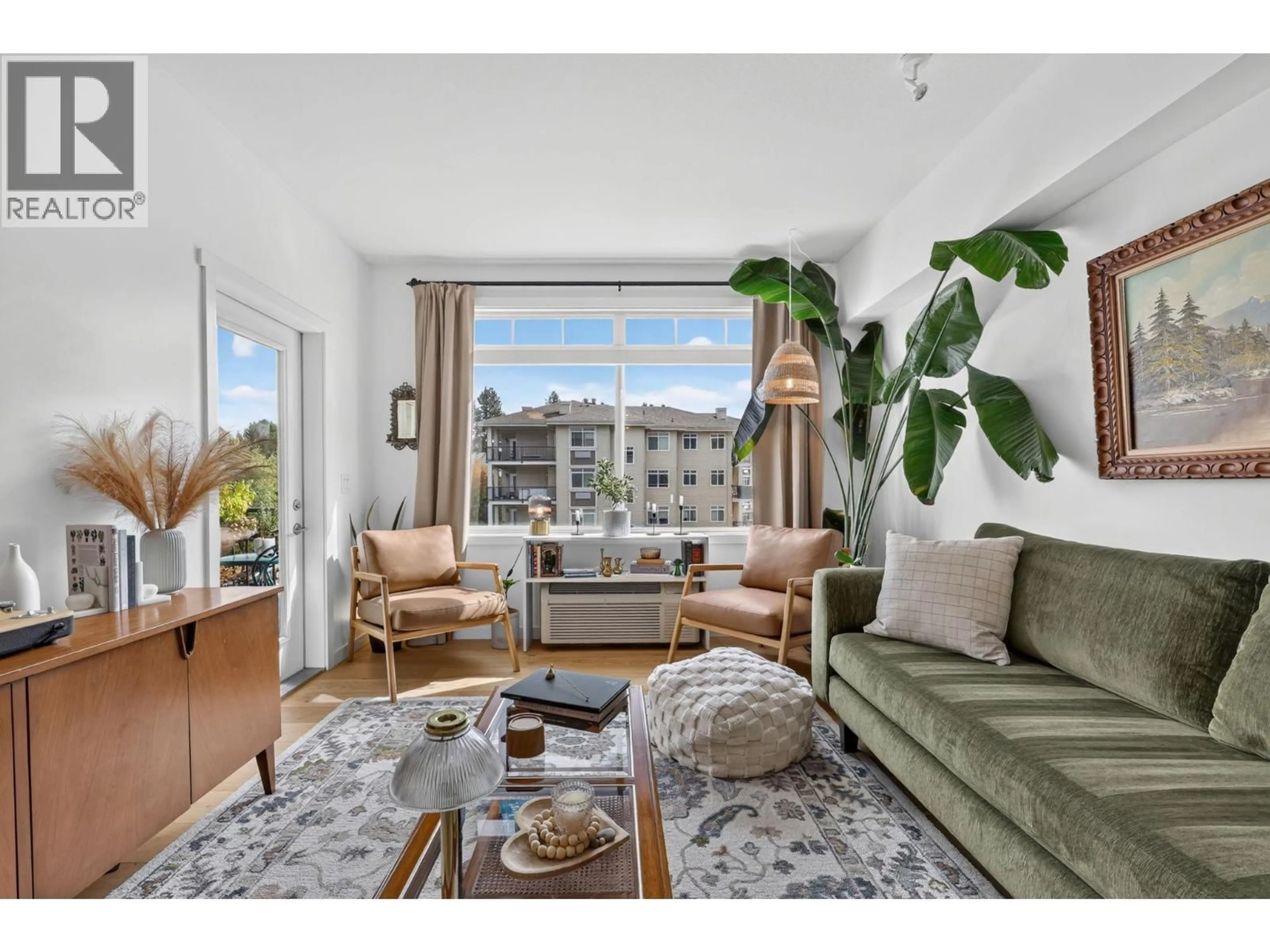 Living room with furniture, unknown for 302 - 1350 RIDGEWAY DRIVE, Kelowna British Columbia V1Y9T8
