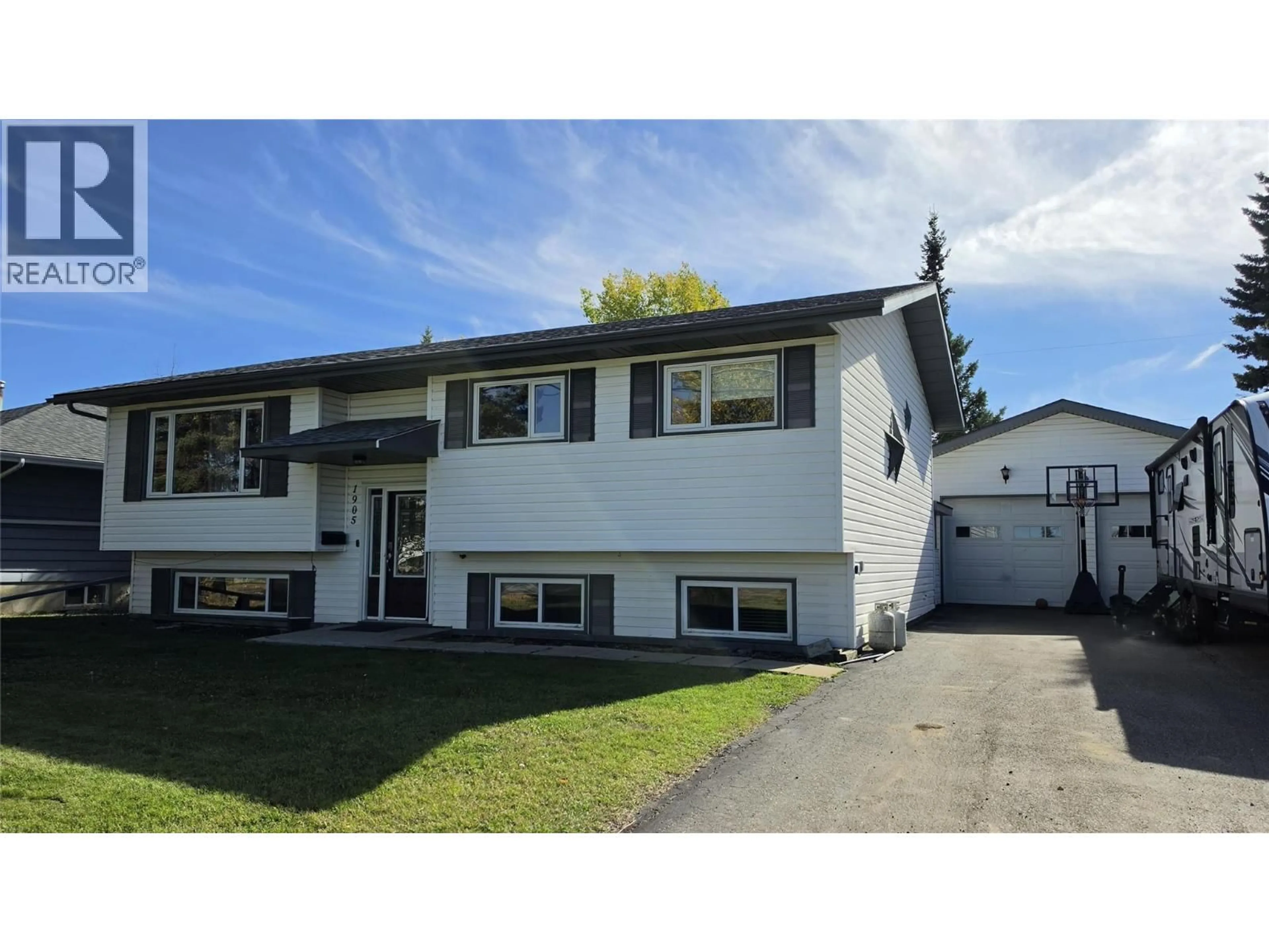 Home with vinyl exterior material, street for 1905 108 AVENUE, Dawson Creek British Columbia V1G2V1