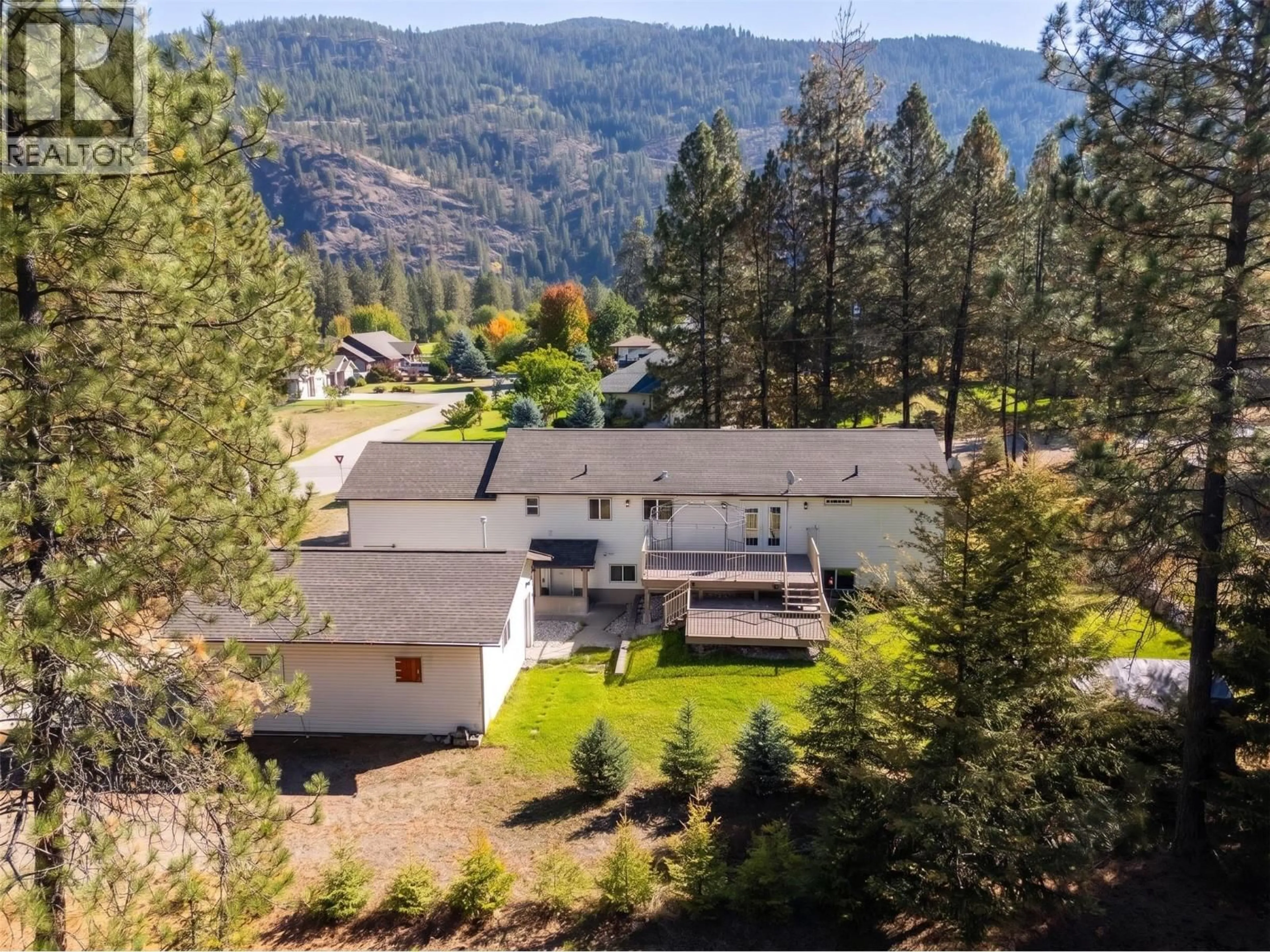 A pic from outside/outdoor area/front of a property/back of a property/a pic from drone, mountain view for 1261 MAIN STREET, Christina Lake British Columbia V0H1E0