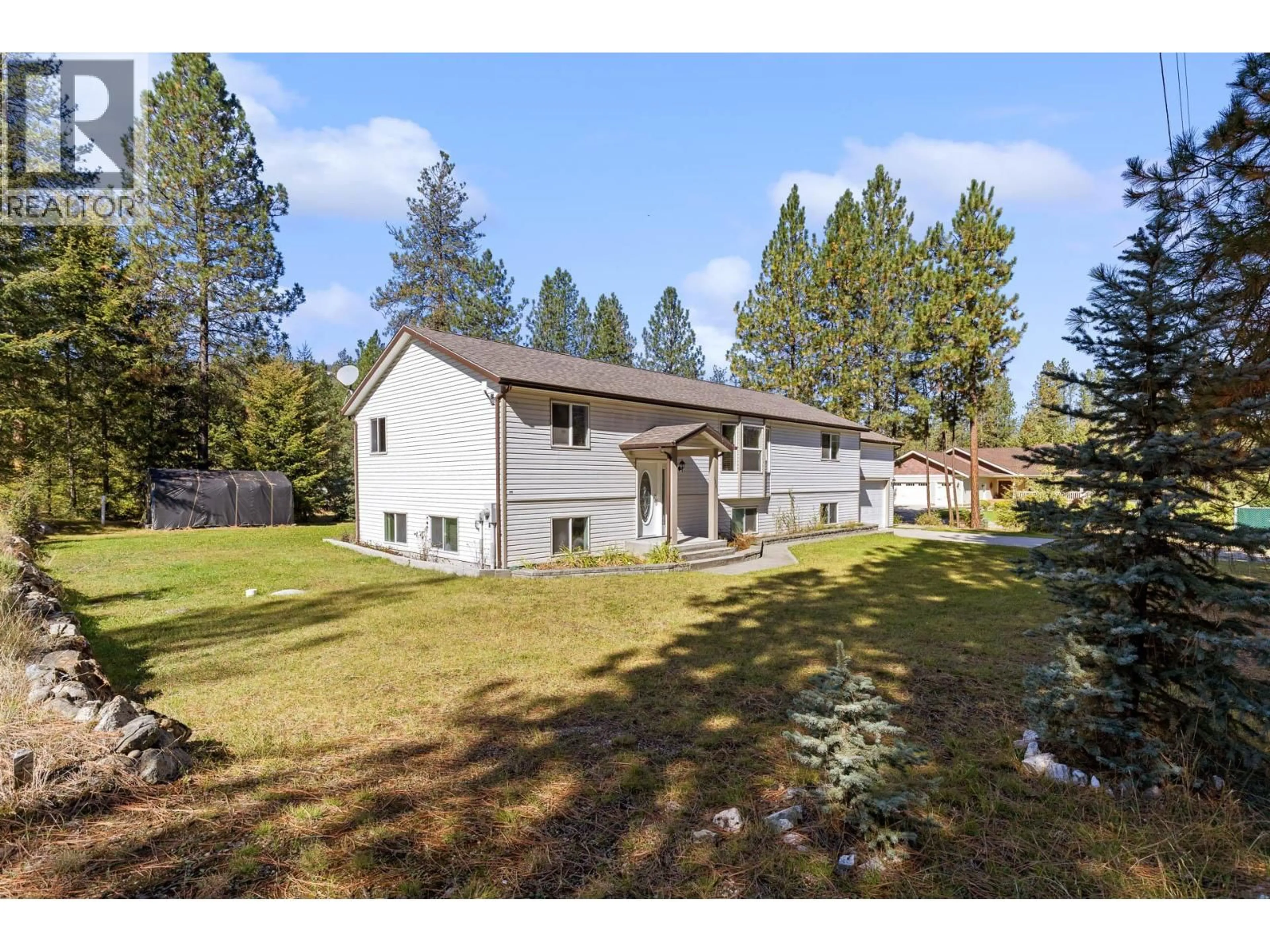 A pic from outside/outdoor area/front of a property/back of a property/a pic from drone, mountain view for 1261 MAIN STREET, Christina Lake British Columbia V0H1E0