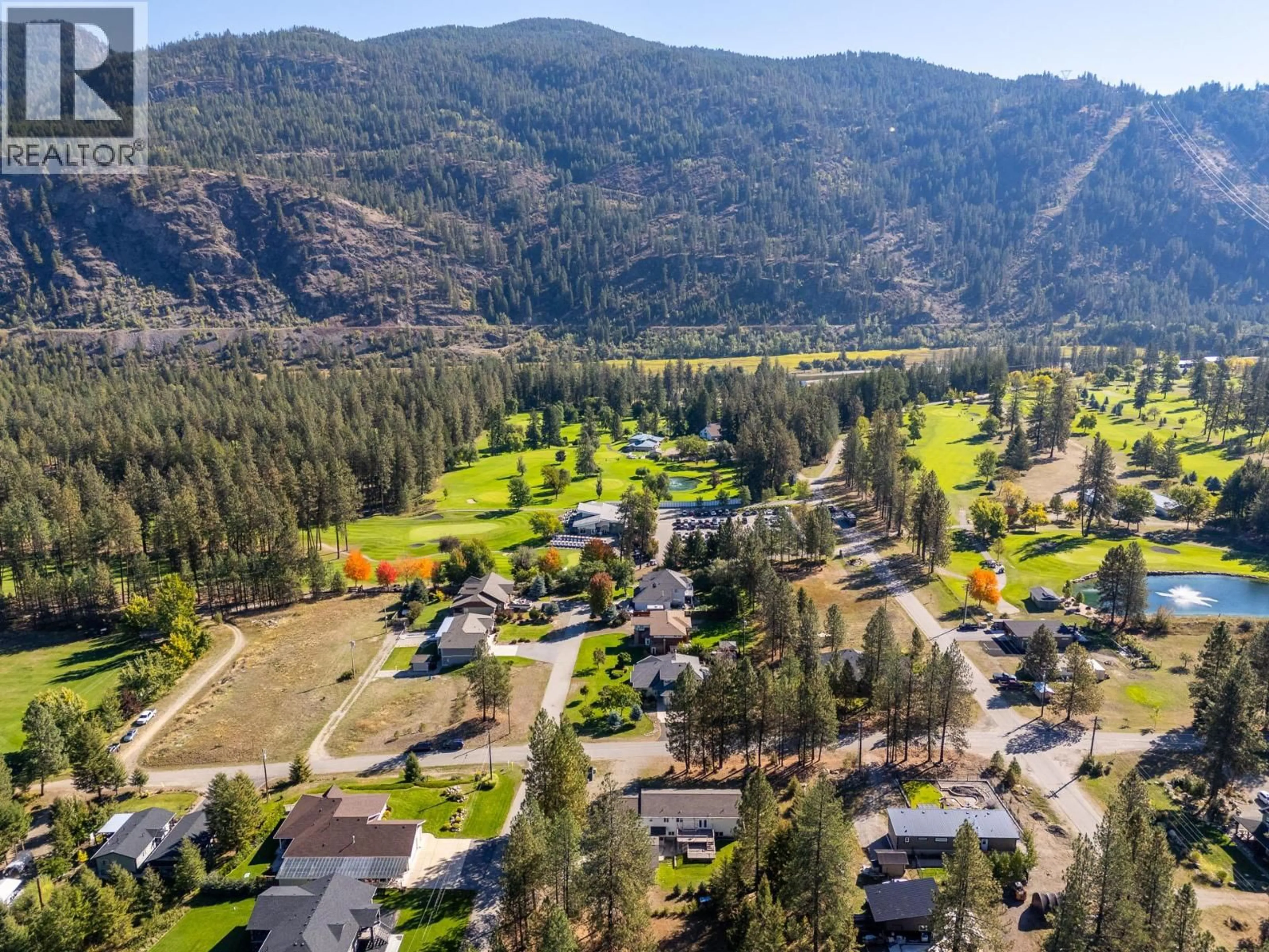 A pic from outside/outdoor area/front of a property/back of a property/a pic from drone, mountain view for 1261 MAIN STREET, Christina Lake British Columbia V0H1E0