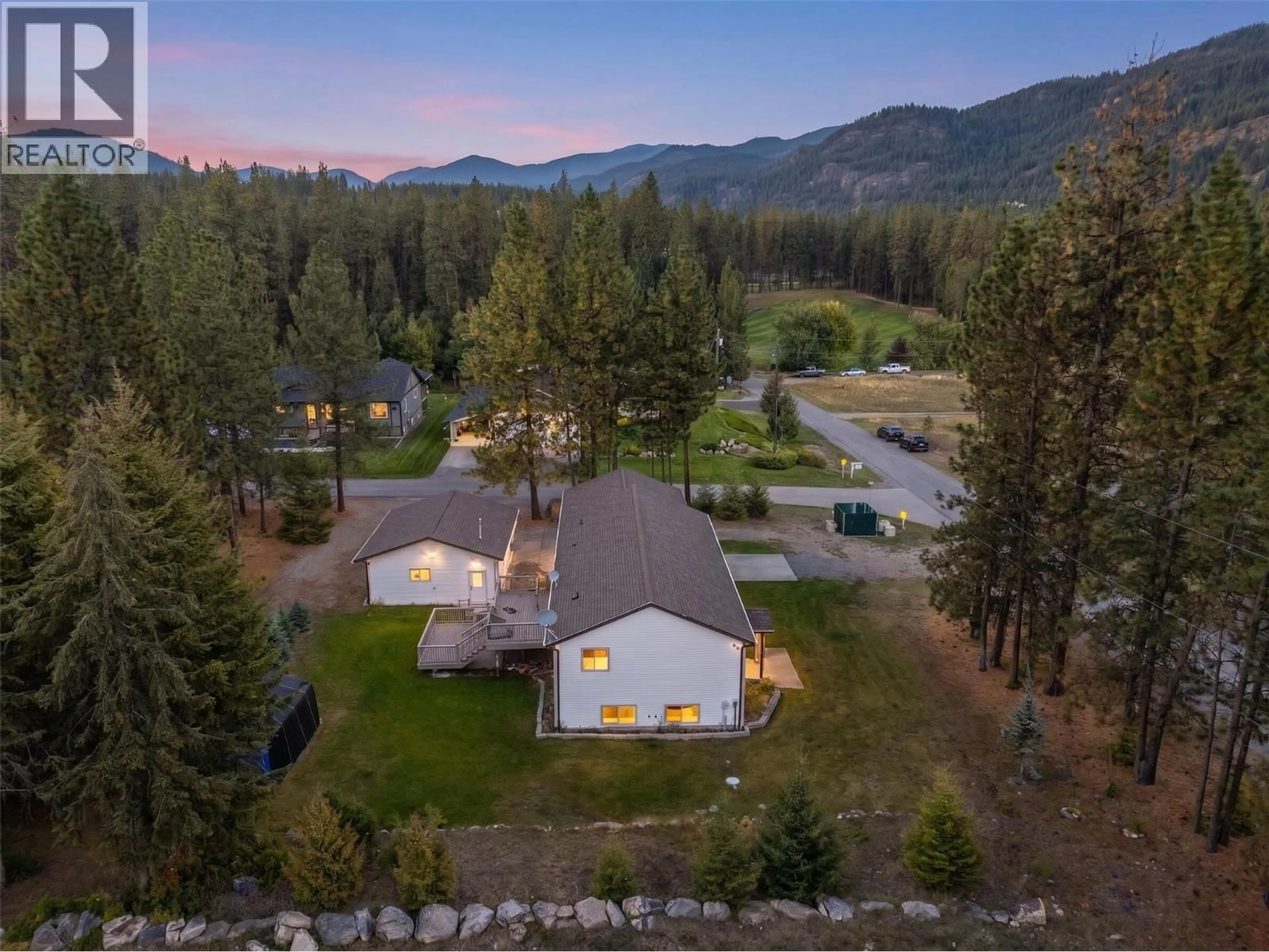 A pic from outside/outdoor area/front of a property/back of a property/a pic from drone, mountain view for 1261 MAIN STREET, Christina Lake British Columbia V0H1E0
