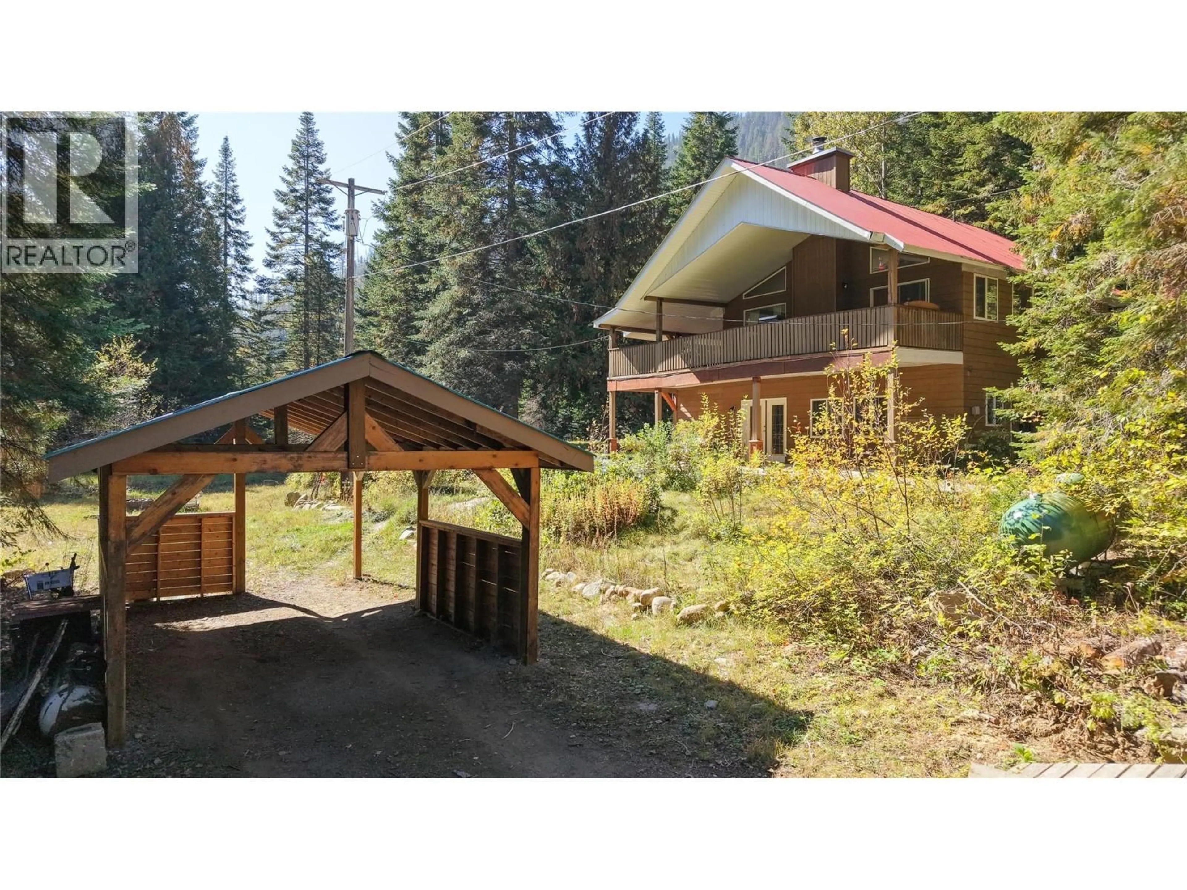 A pic from outside/outdoor area/front of a property/back of a property/a pic from drone, unknown for 113 WESCO ROAD, Ymir British Columbia V0G2K0