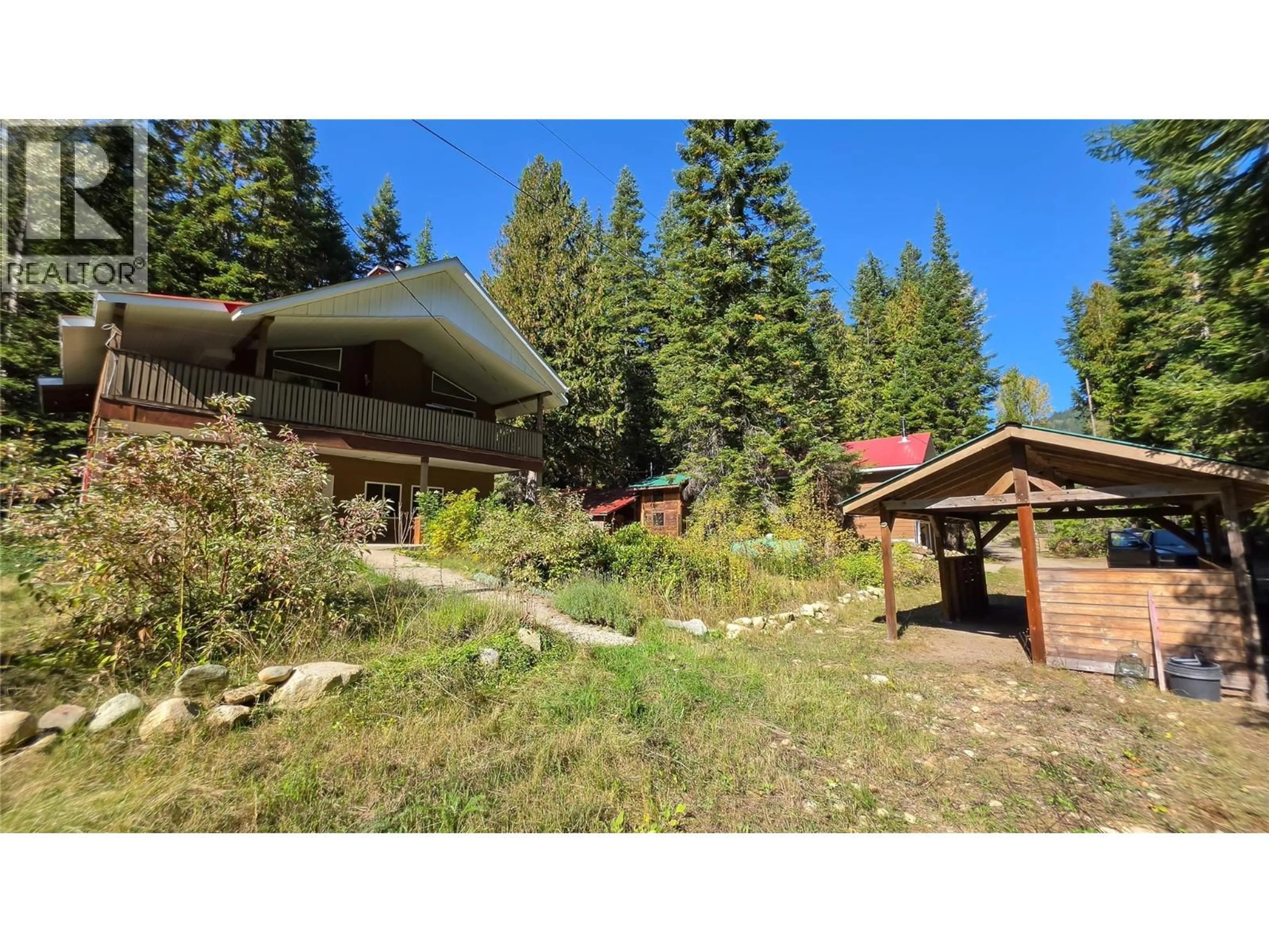 A pic from outside/outdoor area/front of a property/back of a property/a pic from drone, unknown for 113 WESCO ROAD, Ymir British Columbia V0G2K0
