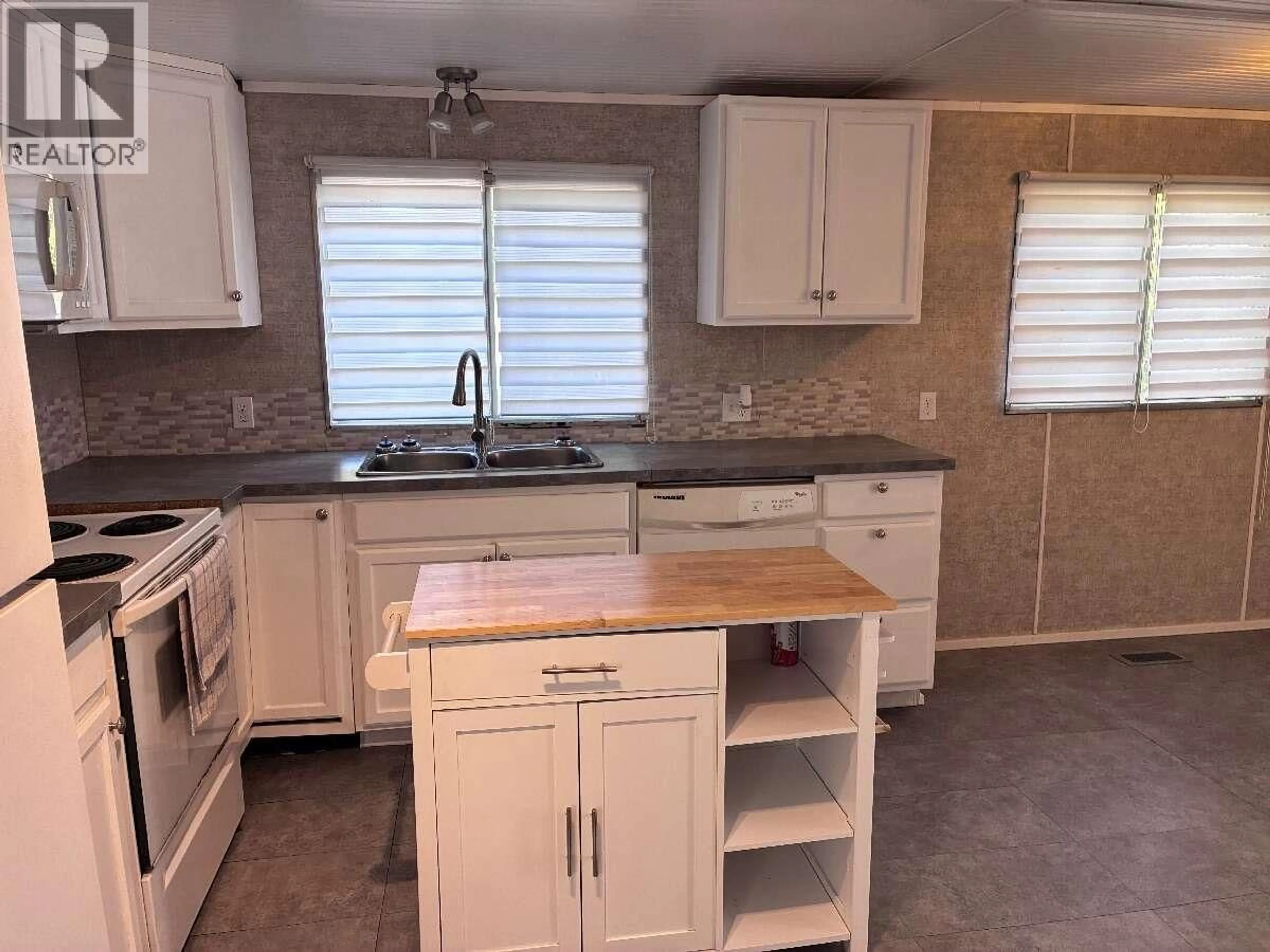 Standard kitchen, ceramic/tile floor for 16 - 500 16TH AVENUE, Genelle British Columbia V0G1G0