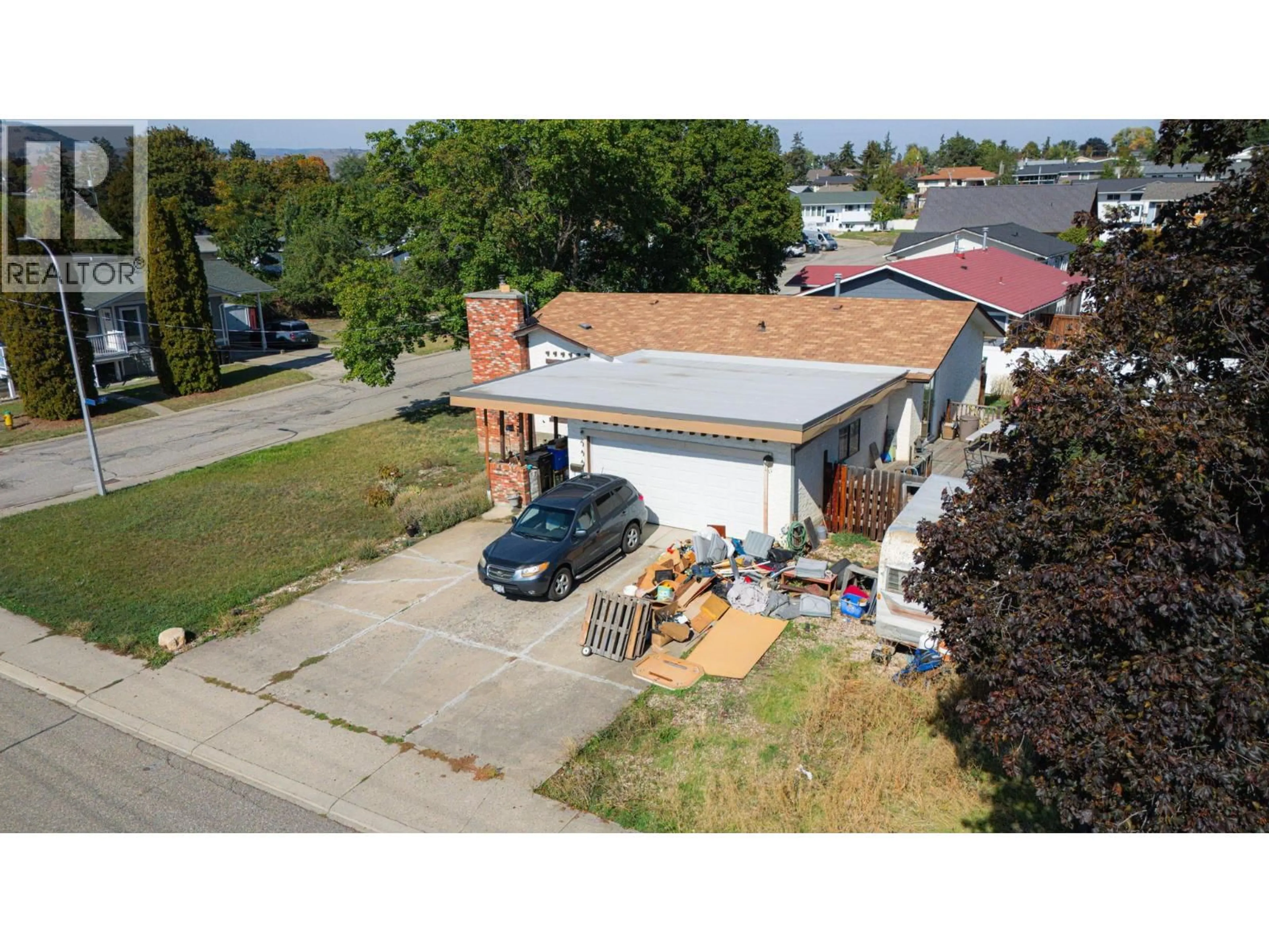 A pic from outside/outdoor area/front of a property/back of a property/a pic from drone, street for 1311 25TH AVENUE, Vernon British Columbia V1T7L5