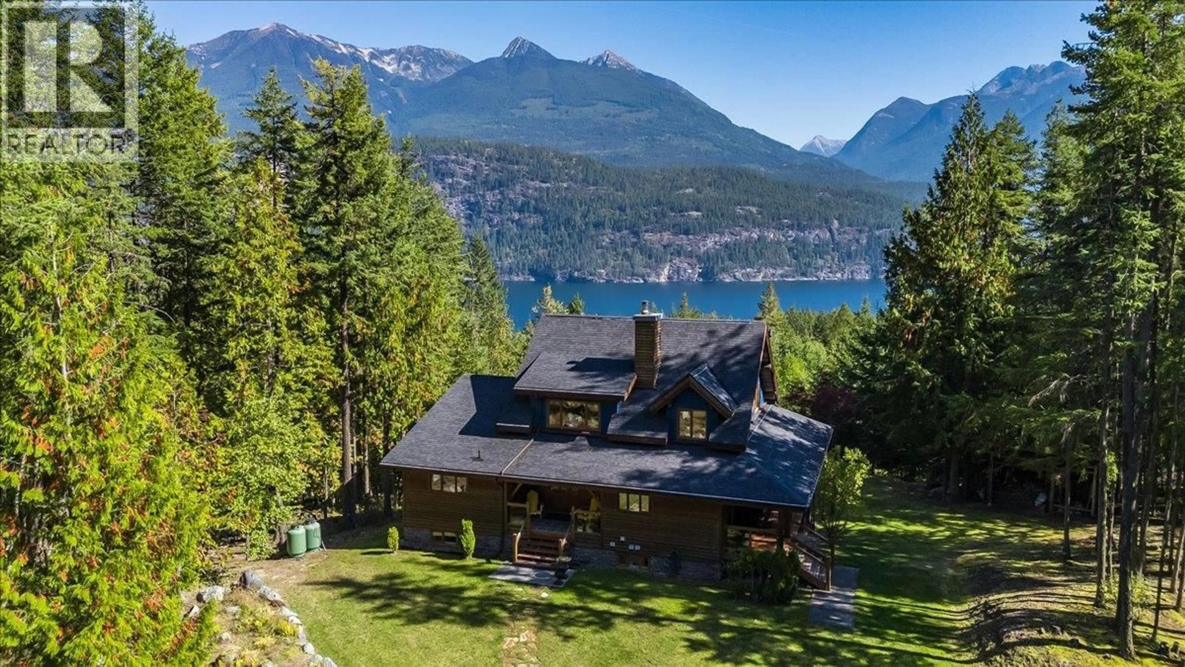 A pic from outside/outdoor area/front of a property/back of a property/a pic from drone, water/lake/river/ocean view for 9233 31 HIGHWAY, Kaslo British Columbia V0G1M0