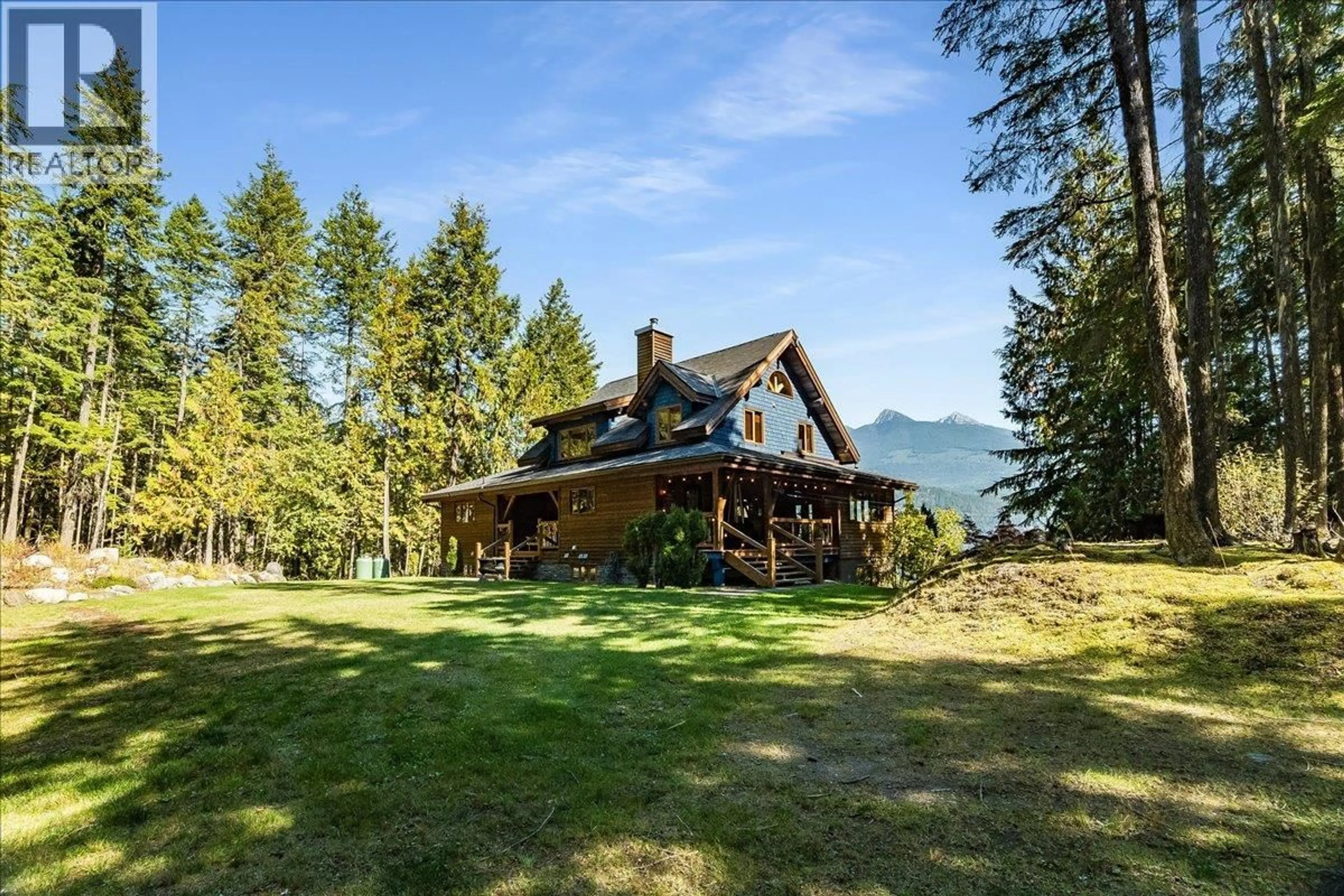A pic from outside/outdoor area/front of a property/back of a property/a pic from drone, mountain view for 9233 31 HIGHWAY, Kaslo British Columbia V0G1M0