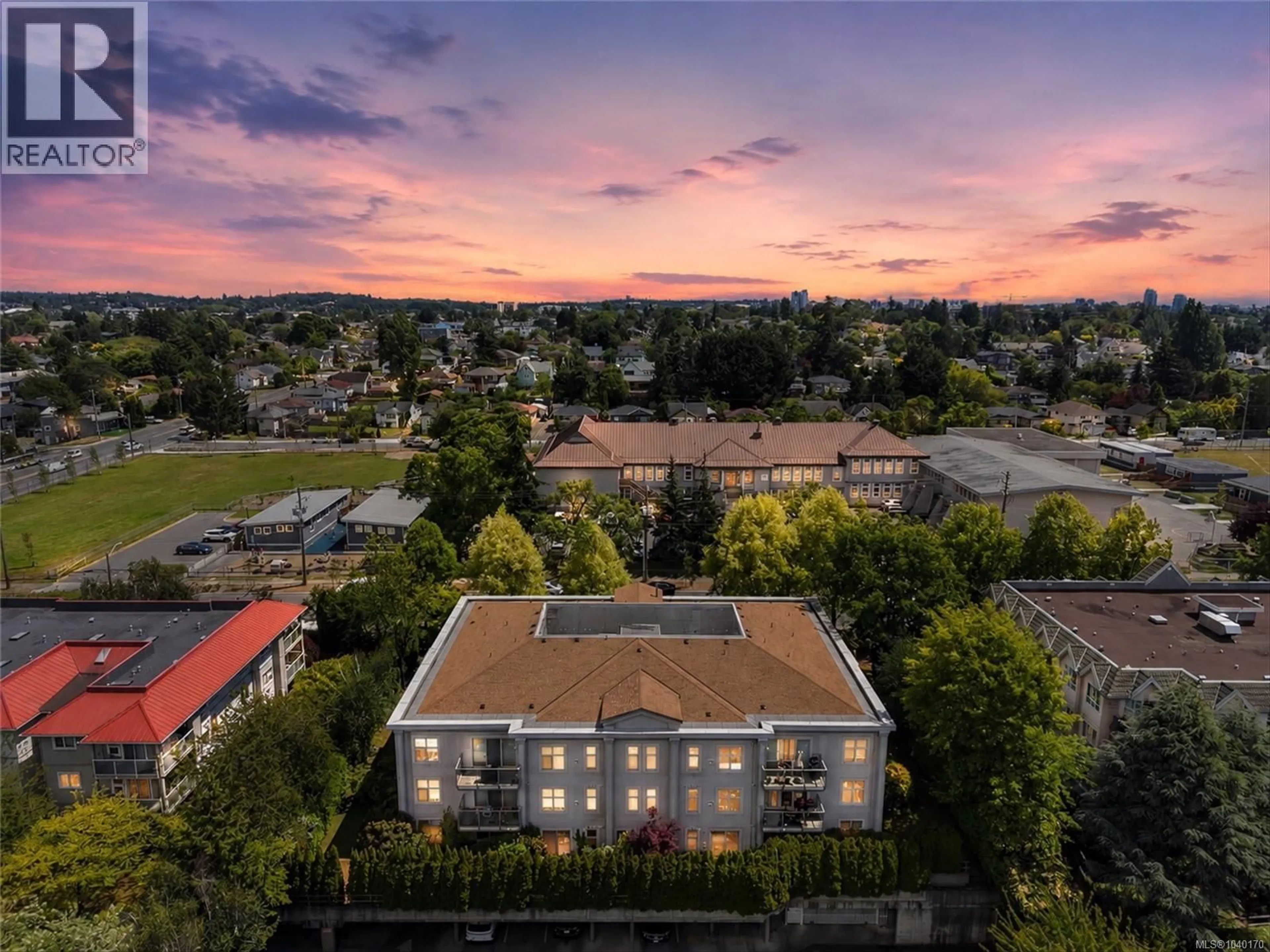 A pic from outside/outdoor area/front of a property/back of a property/a pic from drone, city buildings view from balcony for 407 - 3160 ALBINA STREET, Saanich British Columbia V9A1Z5