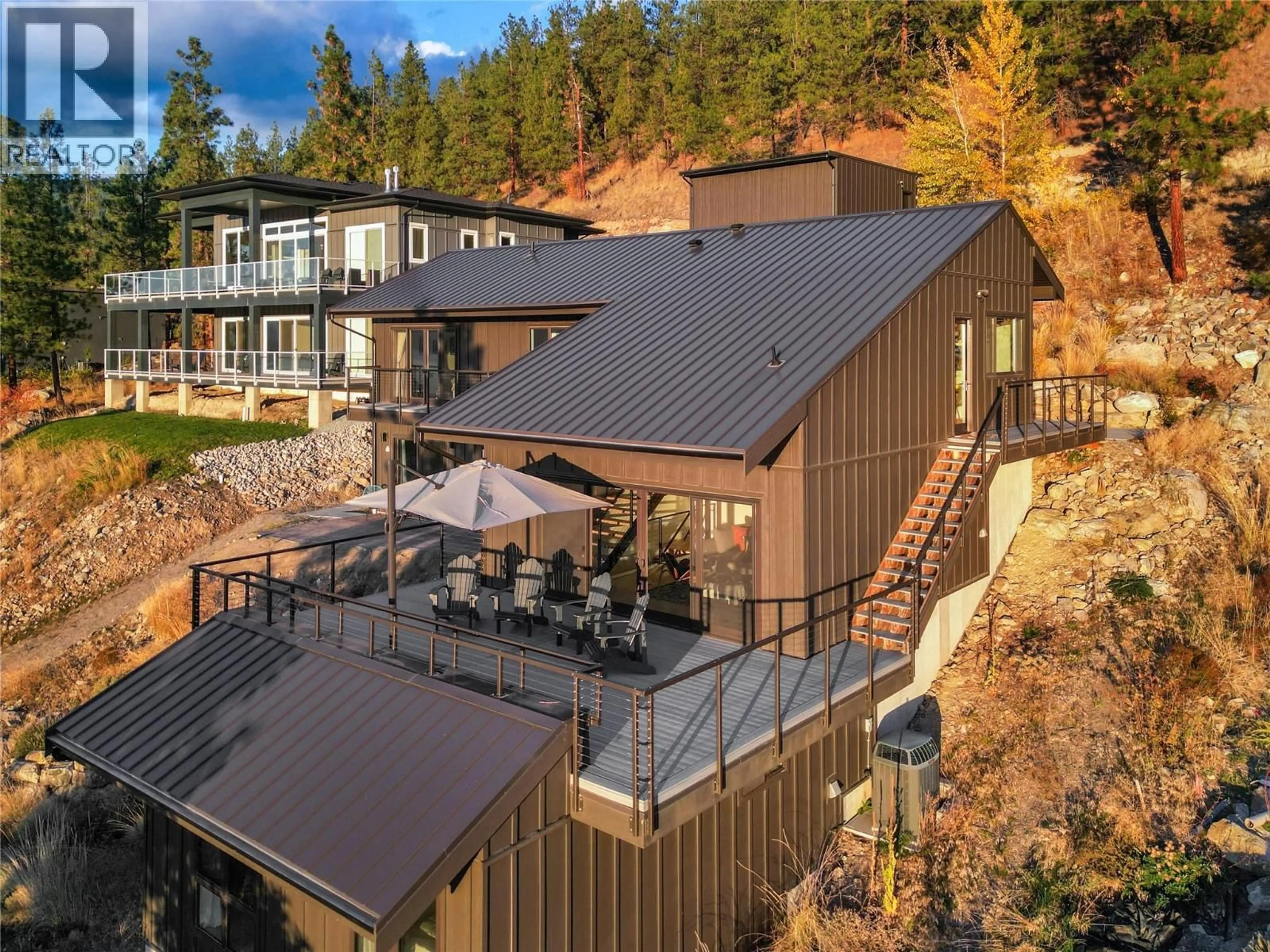 A pic from outside/outdoor area/front of a property/back of a property/a pic from drone, mountain view for 2710 WORKMAN PLACE, Naramata British Columbia V0H1N0