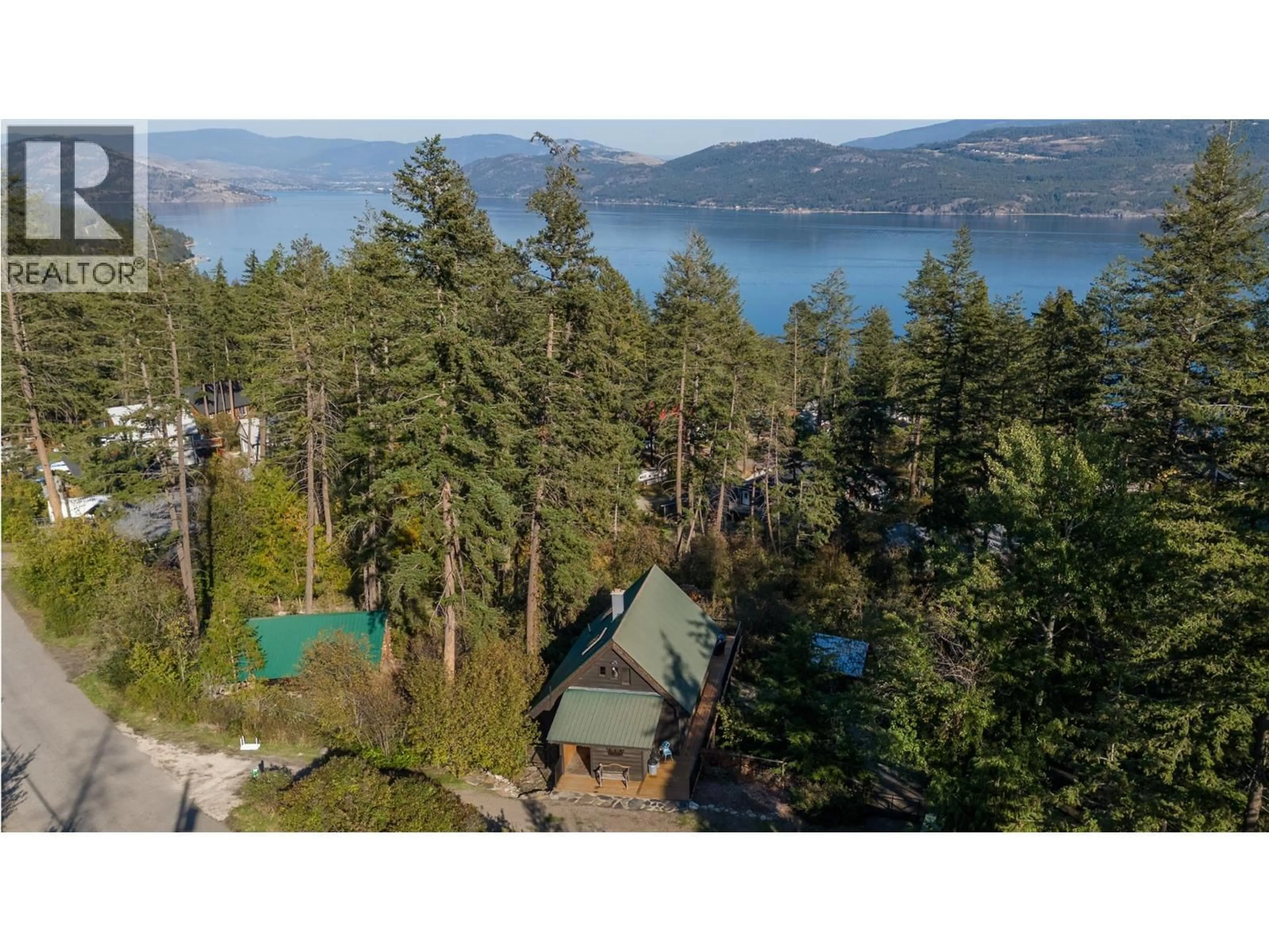 A pic from outside/outdoor area/front of a property/back of a property/a pic from drone, water/lake/river/ocean view for 665 UDELL ROAD, Vernon British Columbia V1H2E3