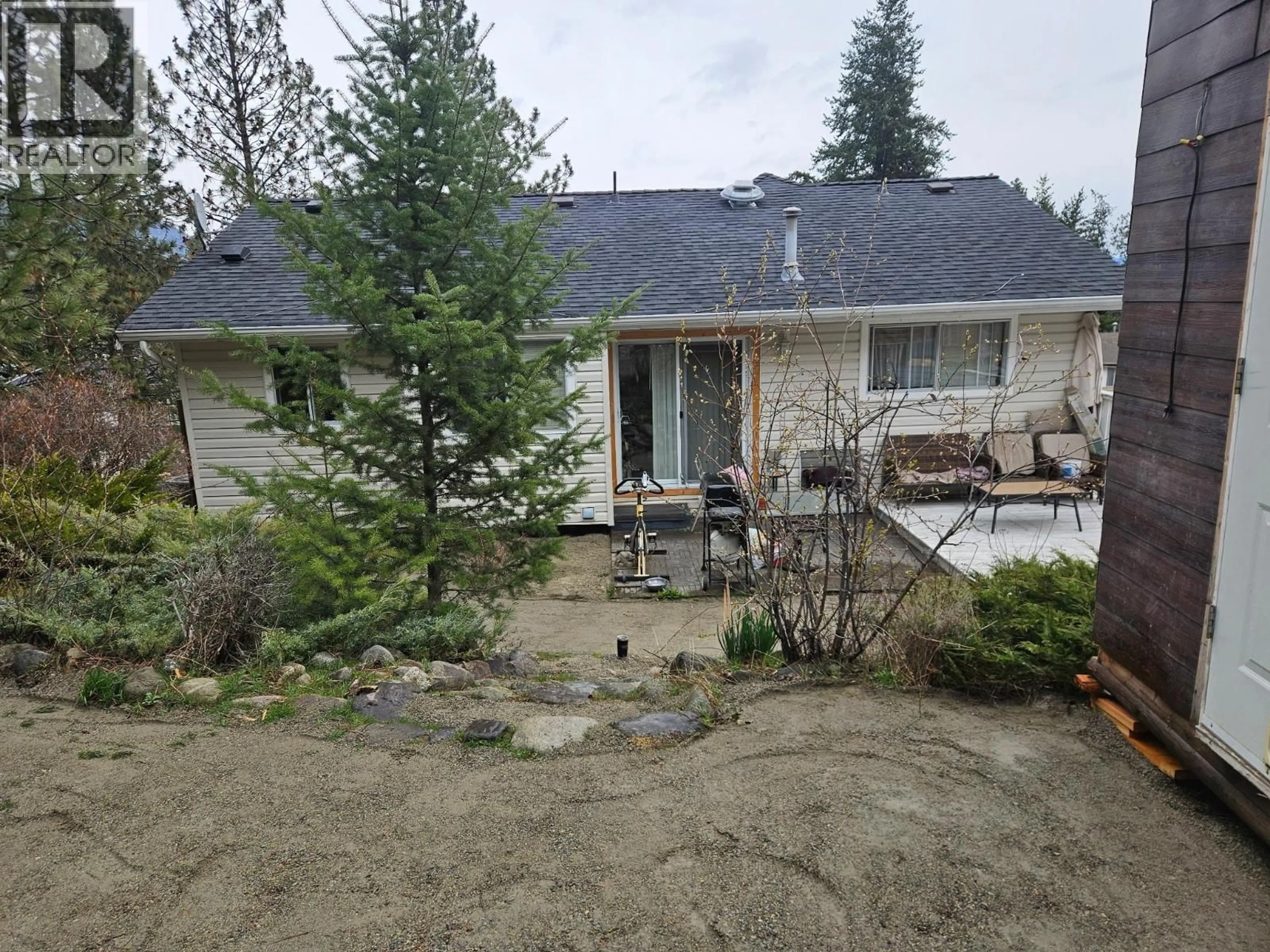 A pic from outside/outdoor area/front of a property/back of a property/a pic from drone, mountain view for 3368 MCIVER ROAD, West Kelowna British Columbia V4T1G7