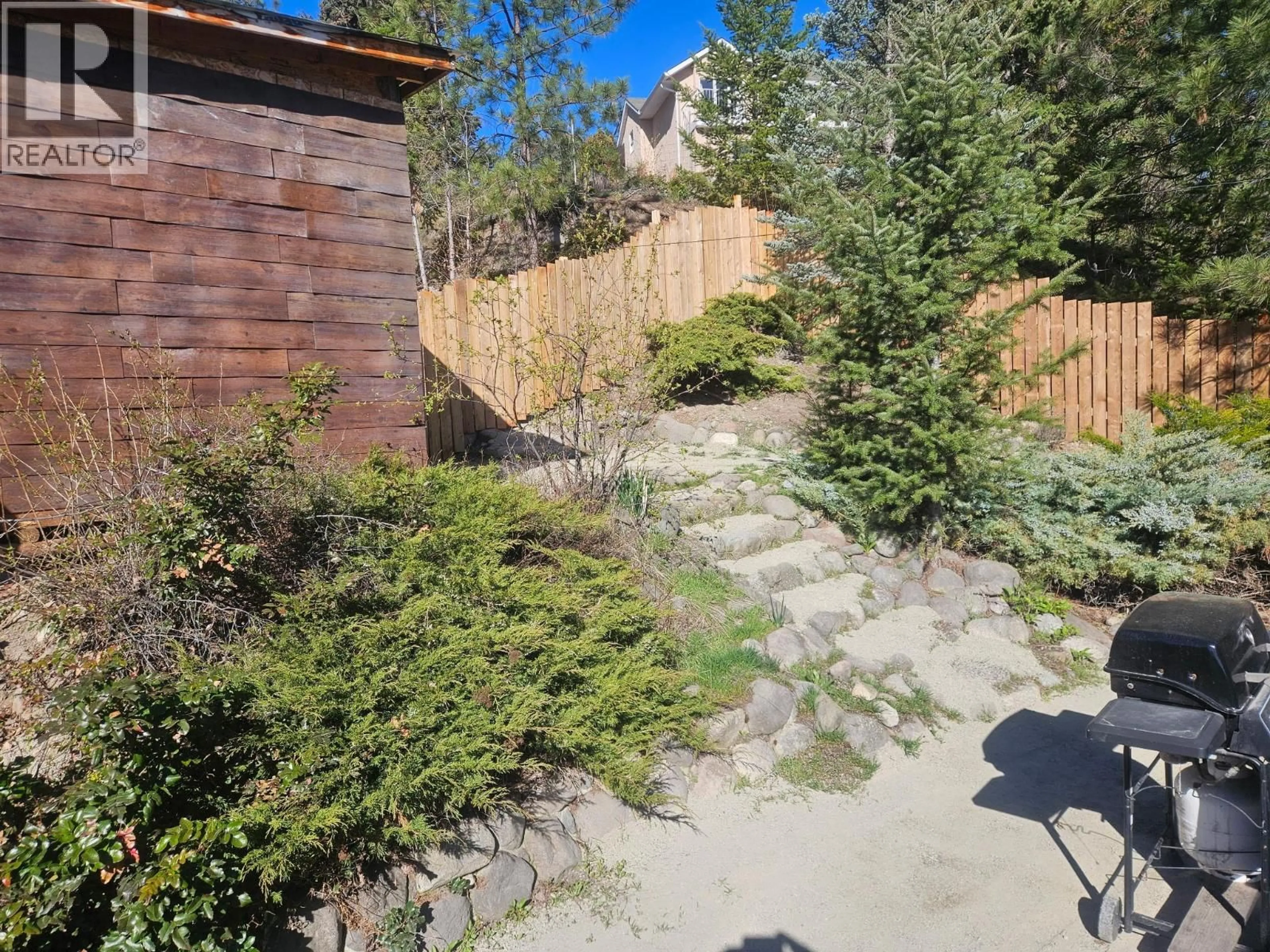 A pic from outside/outdoor area/front of a property/back of a property/a pic from drone, unknown for 3368 MCIVER ROAD, West Kelowna British Columbia V4T1G7
