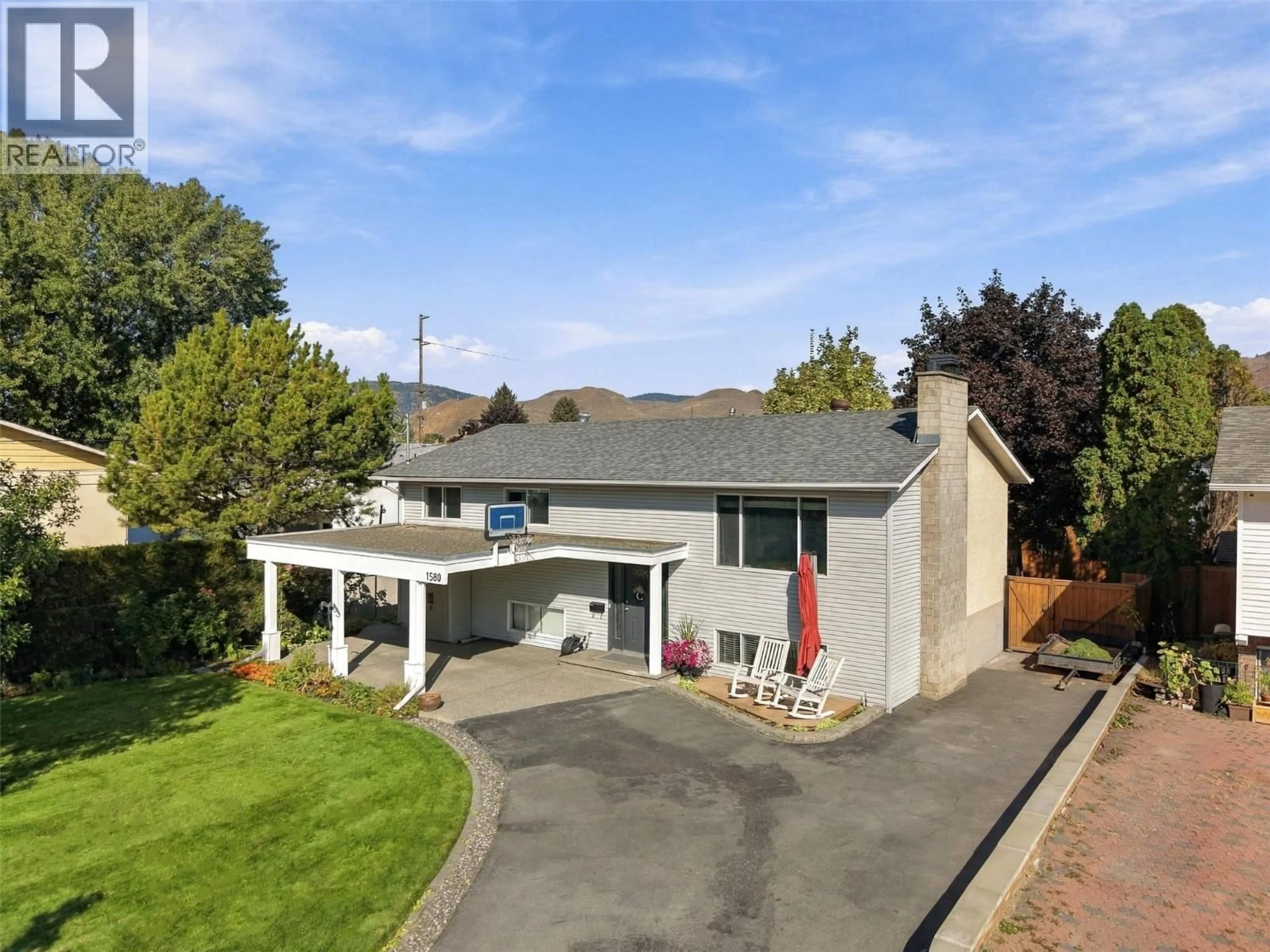 A pic from outside/outdoor area/front of a property/back of a property/a pic from drone, street for 1580 HAPPYVALE PLACE, Kamloops British Columbia V2B7T9