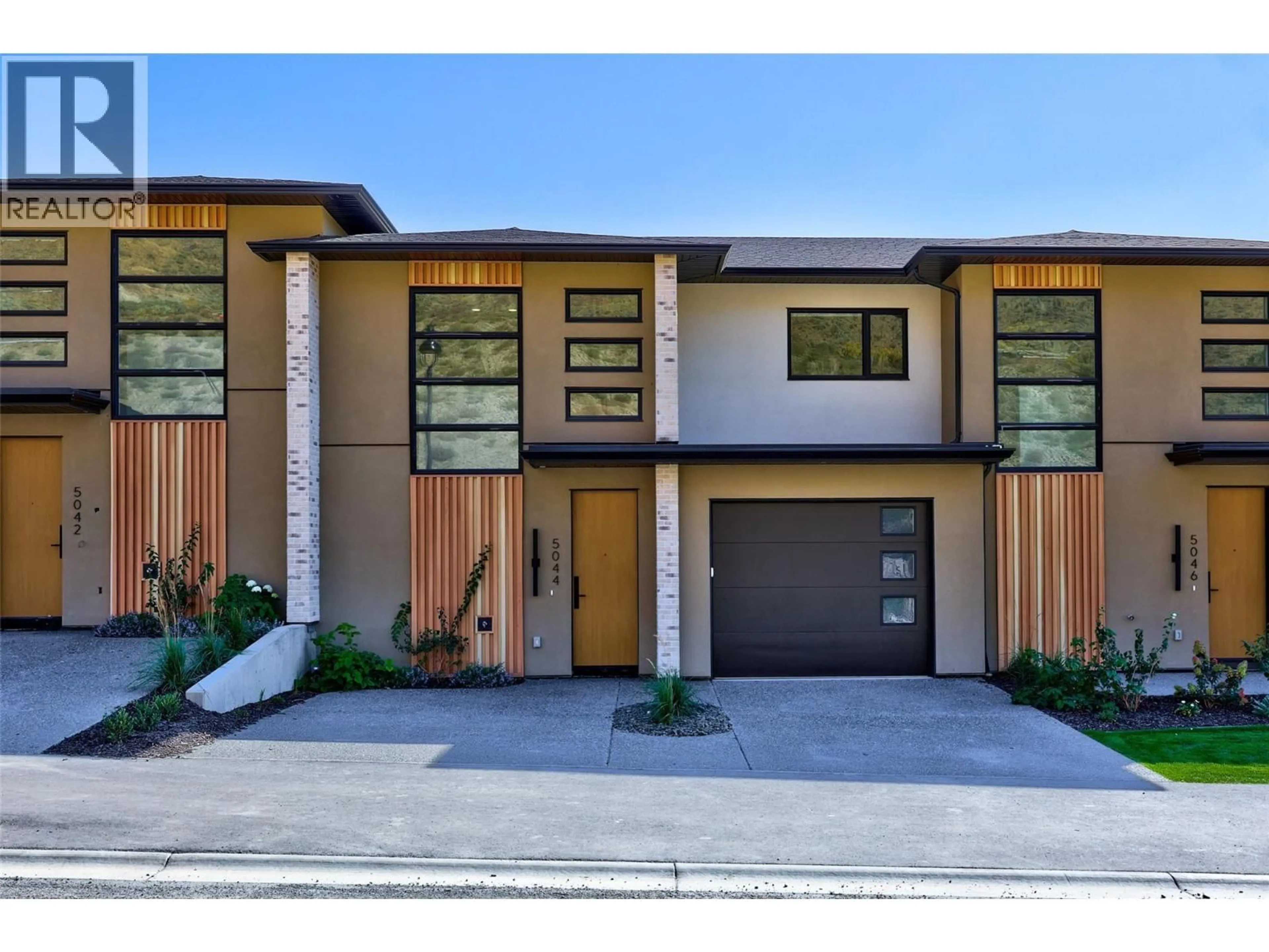 Home with brick exterior material, street for 5044 SUN RIVERS DRIVE, Kamloops British Columbia V2H0E7
