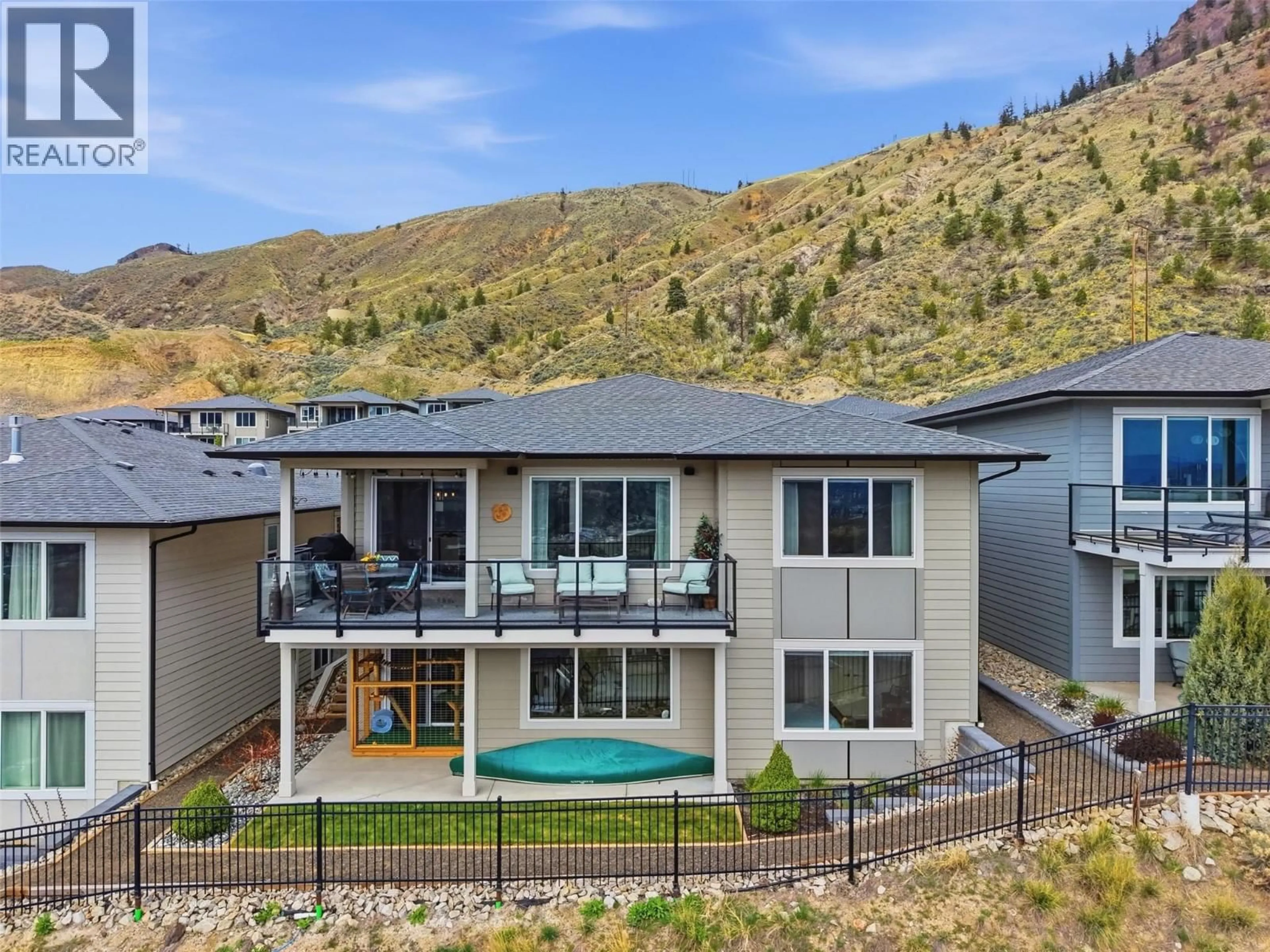 A pic from outside/outdoor area/front of a property/back of a property/a pic from drone, mountain view for 4012 RIO VISTA WAY, Kamloops British Columbia V2H0E1
