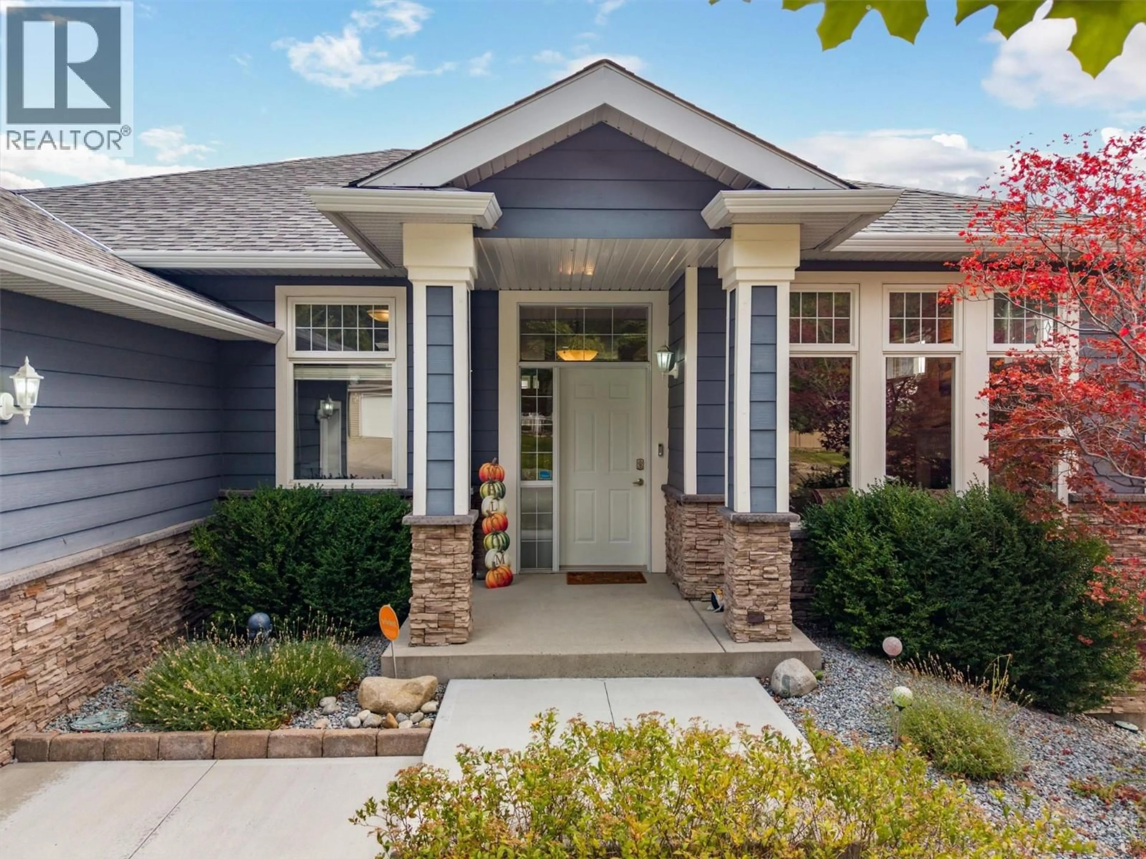 Home with vinyl exterior material, street for 2280 SHANNON HILLS DRIVE, West Kelowna British Columbia V4T2P1