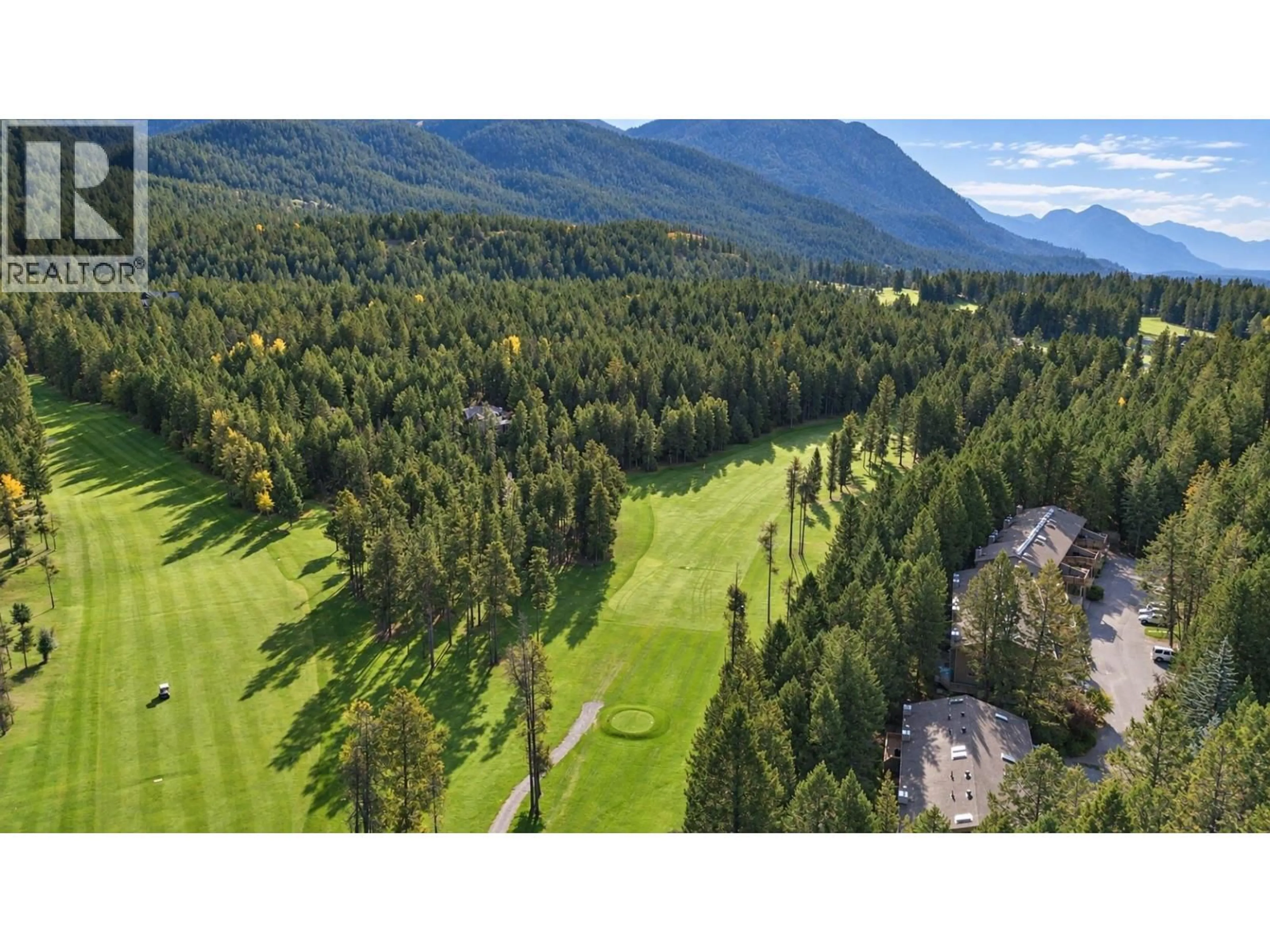A pic from outside/outdoor area/front of a property/back of a property/a pic from drone, mountain view for 1 - 7977 RADIUM GOLF COURSE ROAD, Radium Hot Springs British Columbia V0A1M0