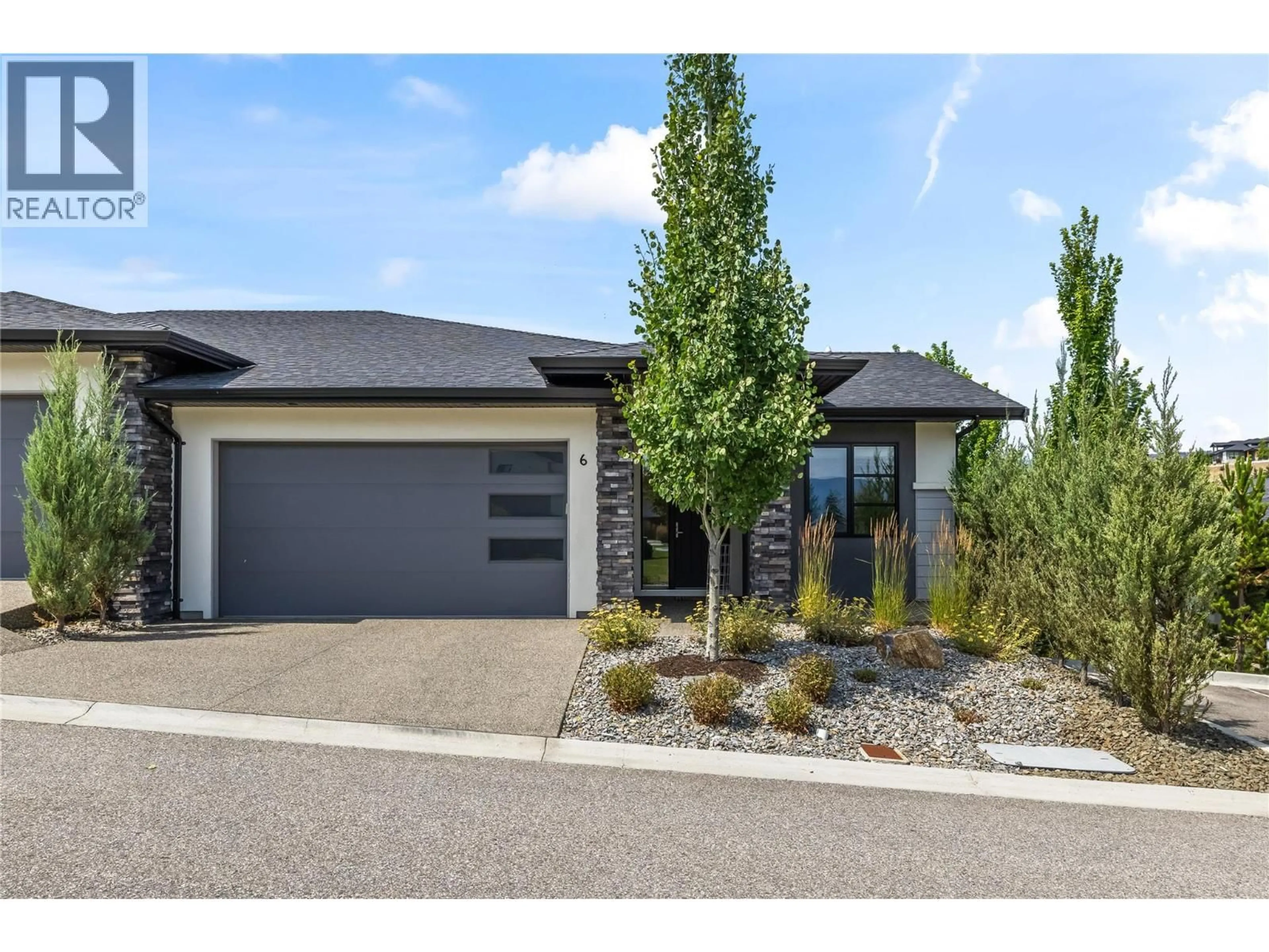 Home with brick exterior material, street for 6 - 1349 ROCKY POINT DRIVE, Kelowna British Columbia V1V0B5