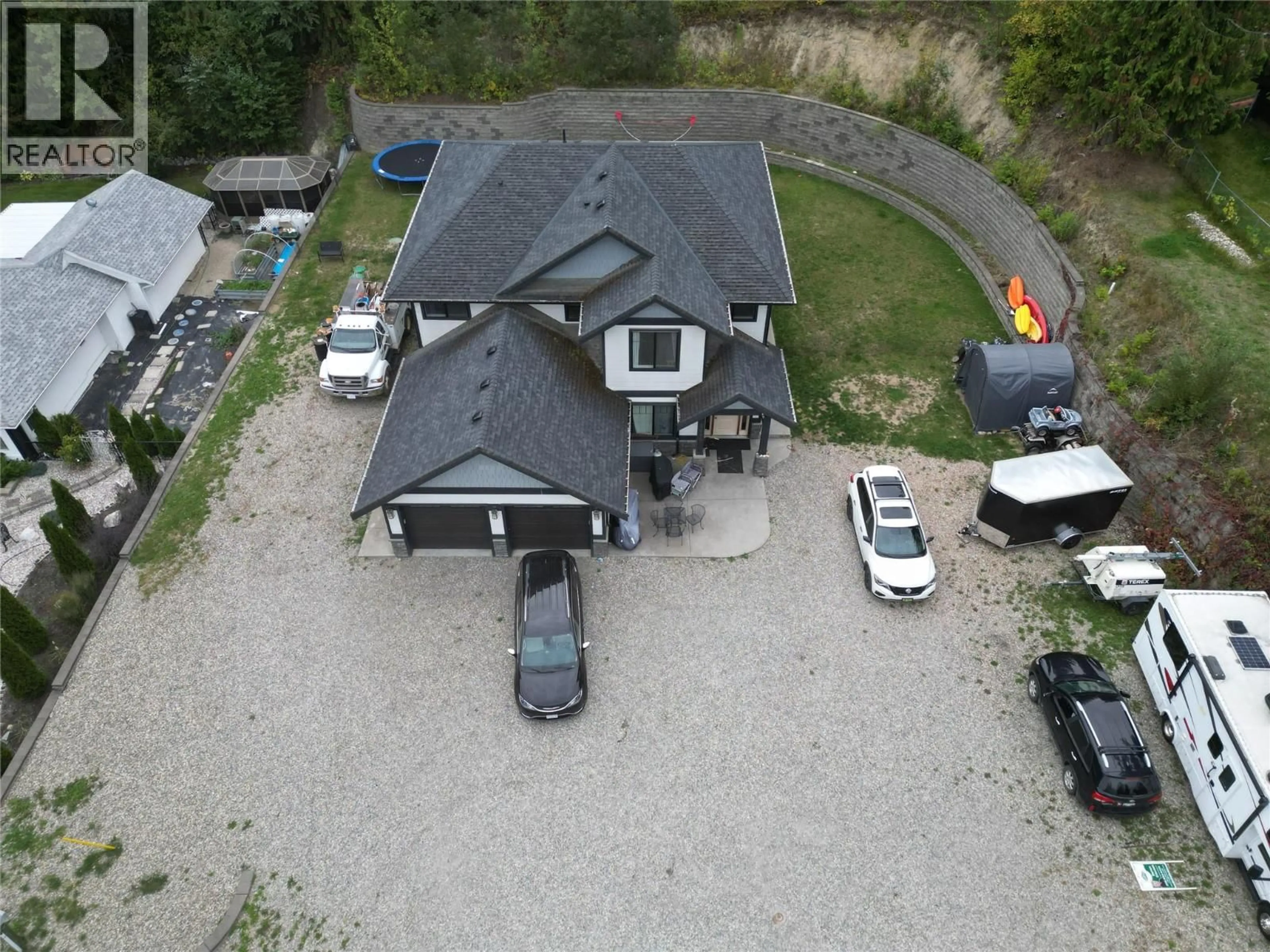 A pic from outside/outdoor area/front of a property/back of a property/a pic from drone, unknown for 2446 CENTENNIAL DRIVE, Blind Bay British Columbia V0E1H0