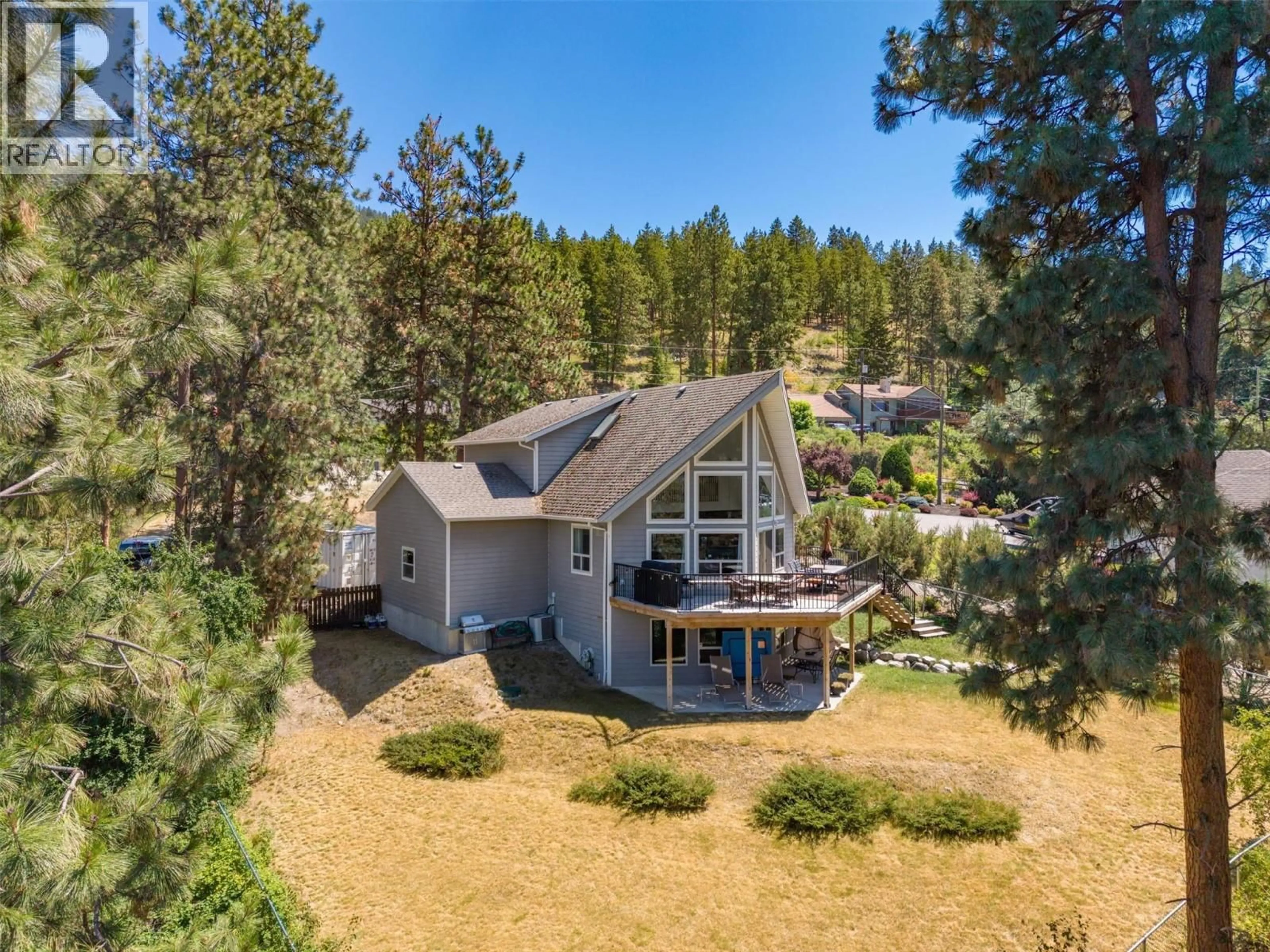 A pic from outside/outdoor area/front of a property/back of a property/a pic from drone, water/lake/river/ocean view for 16490 COMMONAGE ROAD, Lake Country British Columbia V4V1B3