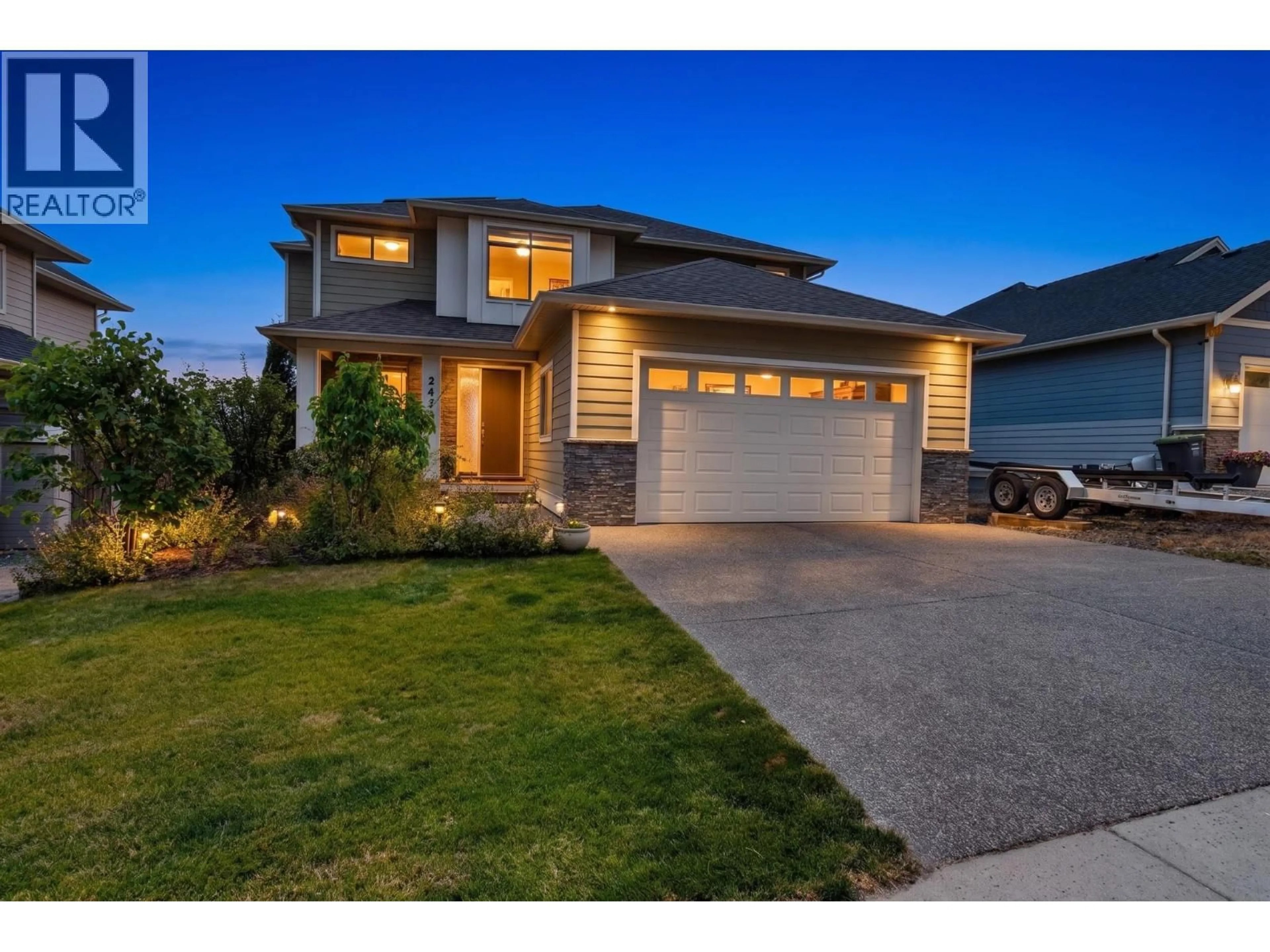 Home with vinyl exterior material, street for 2425 TALLUS HEIGHTS DRIVE, West Kelowna British Columbia V4T3K4