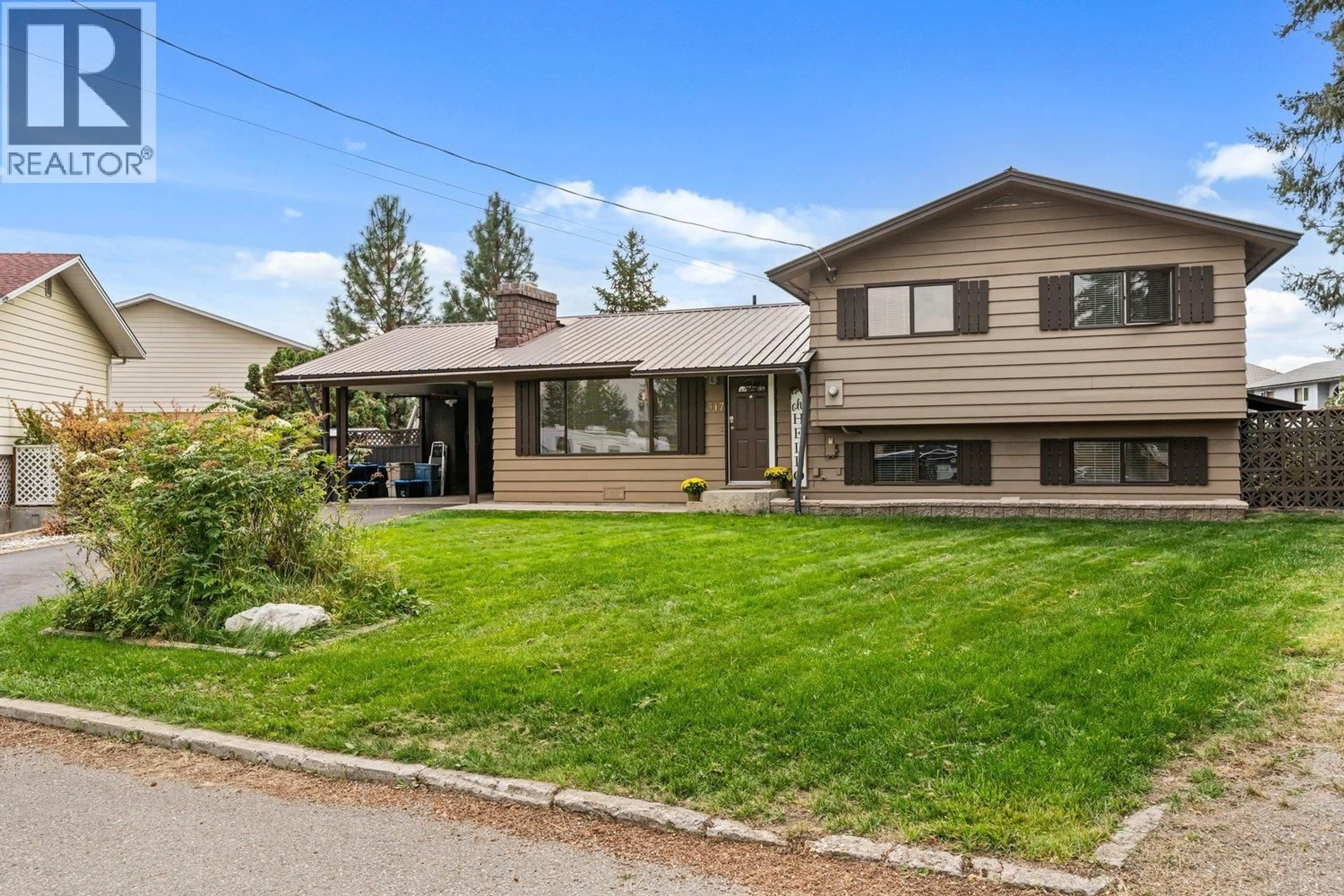Home with vinyl exterior material, street for 317 PANORAMA CRESCENT, Princeton British Columbia V0X1W0