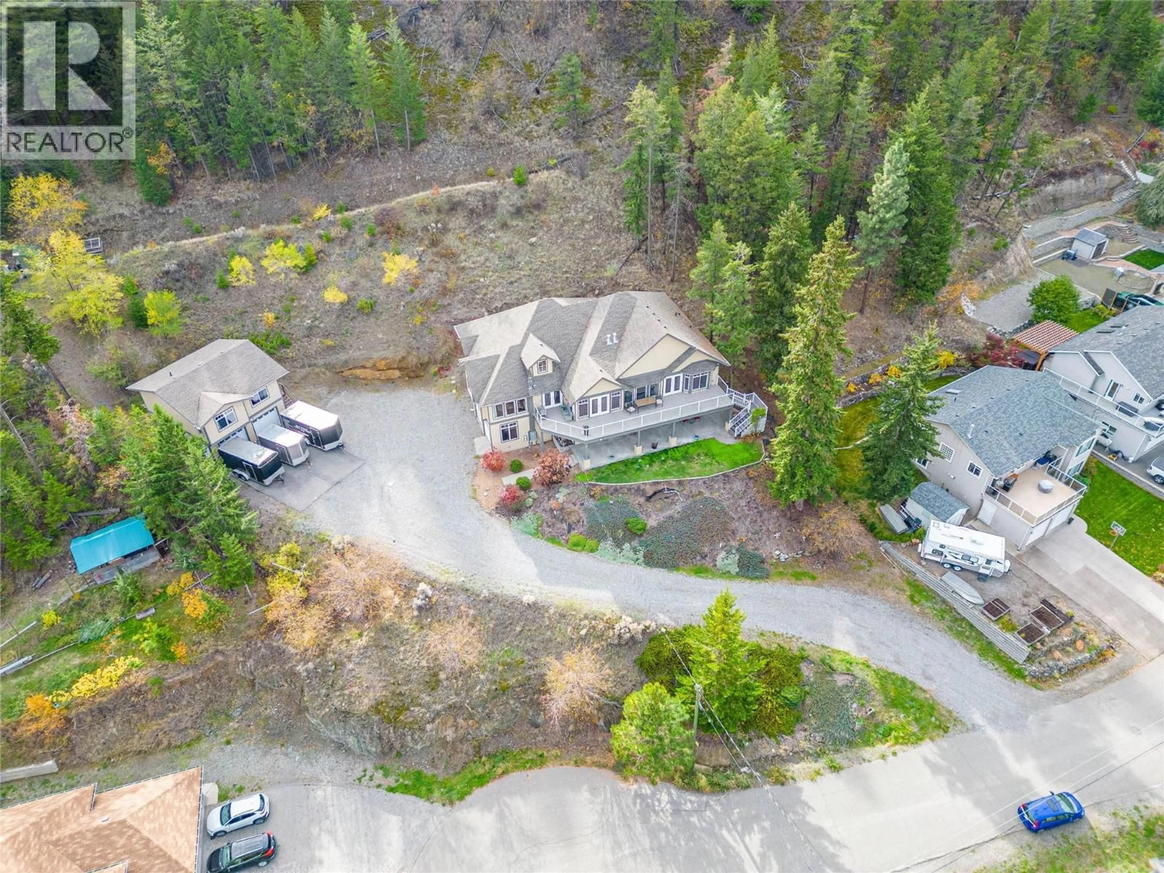 A pic from outside/outdoor area/front of a property/back of a property/a pic from drone, mountain view for 4732 UPLANDS DRIVE, Kamloops British Columbia V2C6S9