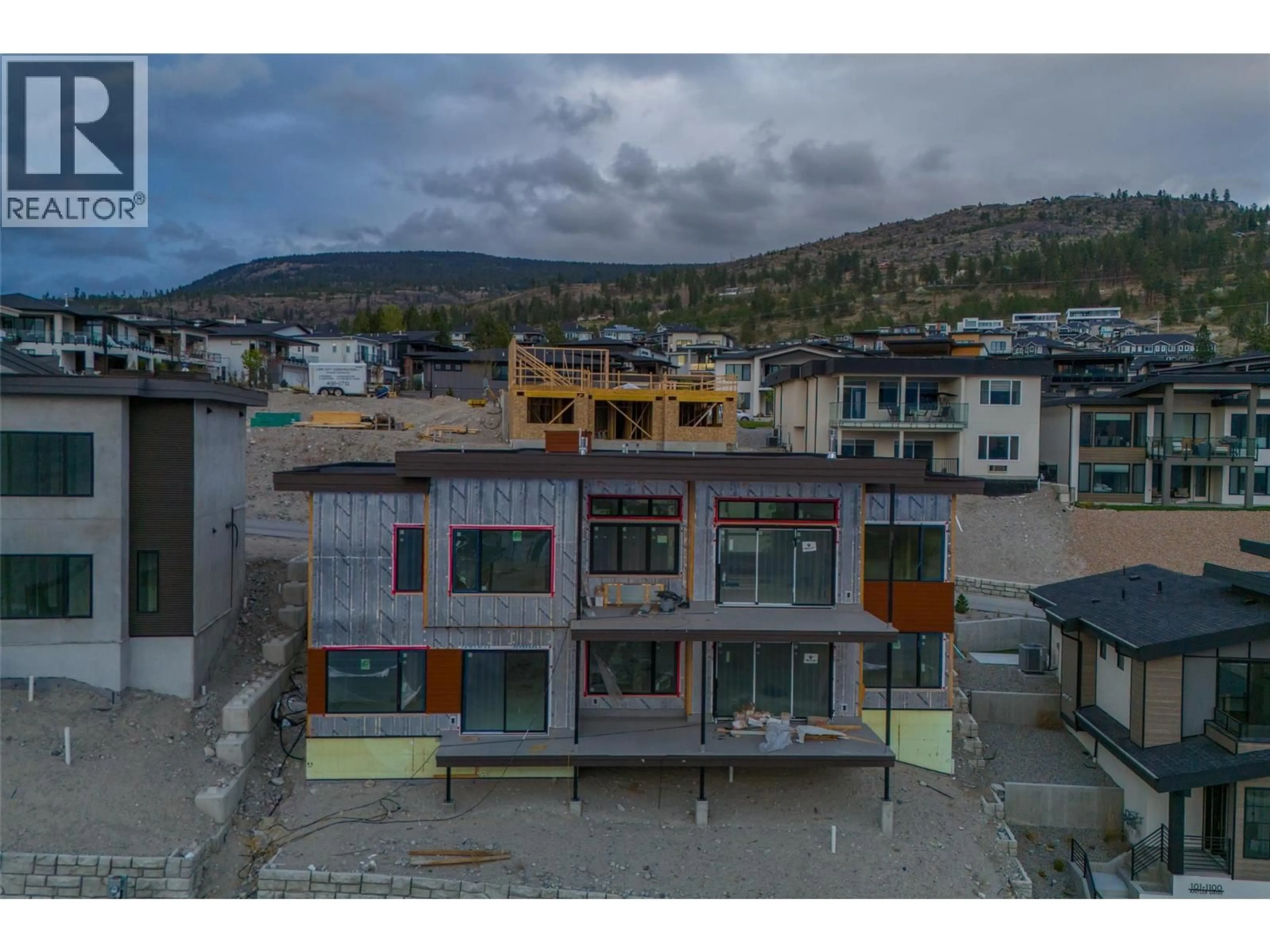 A pic from outside/outdoor area/front of a property/back of a property/a pic from drone, unknown for 1096 ANTLER DRIVE, Penticton British Columbia V2A0C8