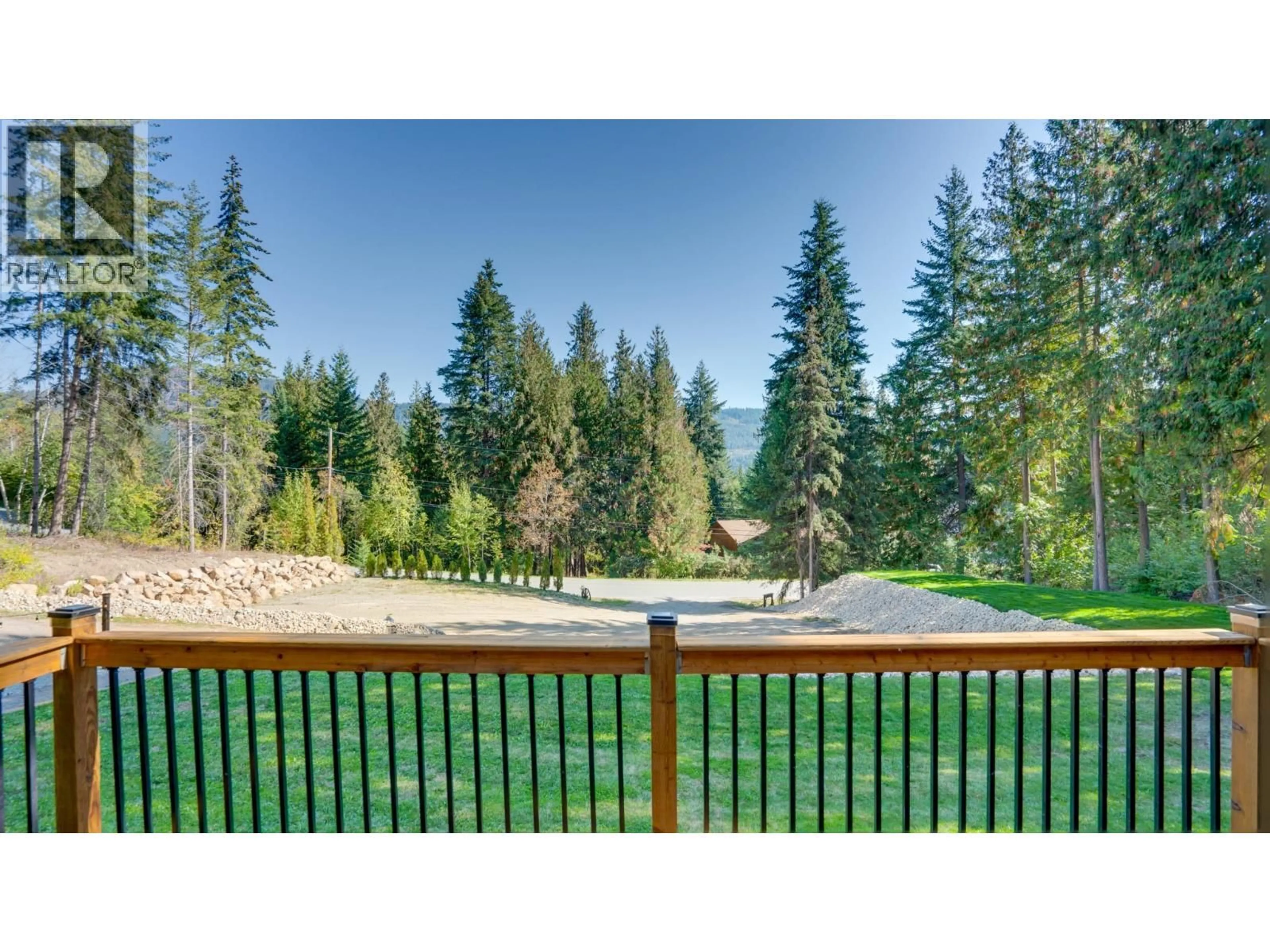 A pic from outside/outdoor area/front of a property/back of a property/a pic from drone, forest/trees view for 2452 FOREST DRIVE, Blind Bay British Columbia V0E1H2