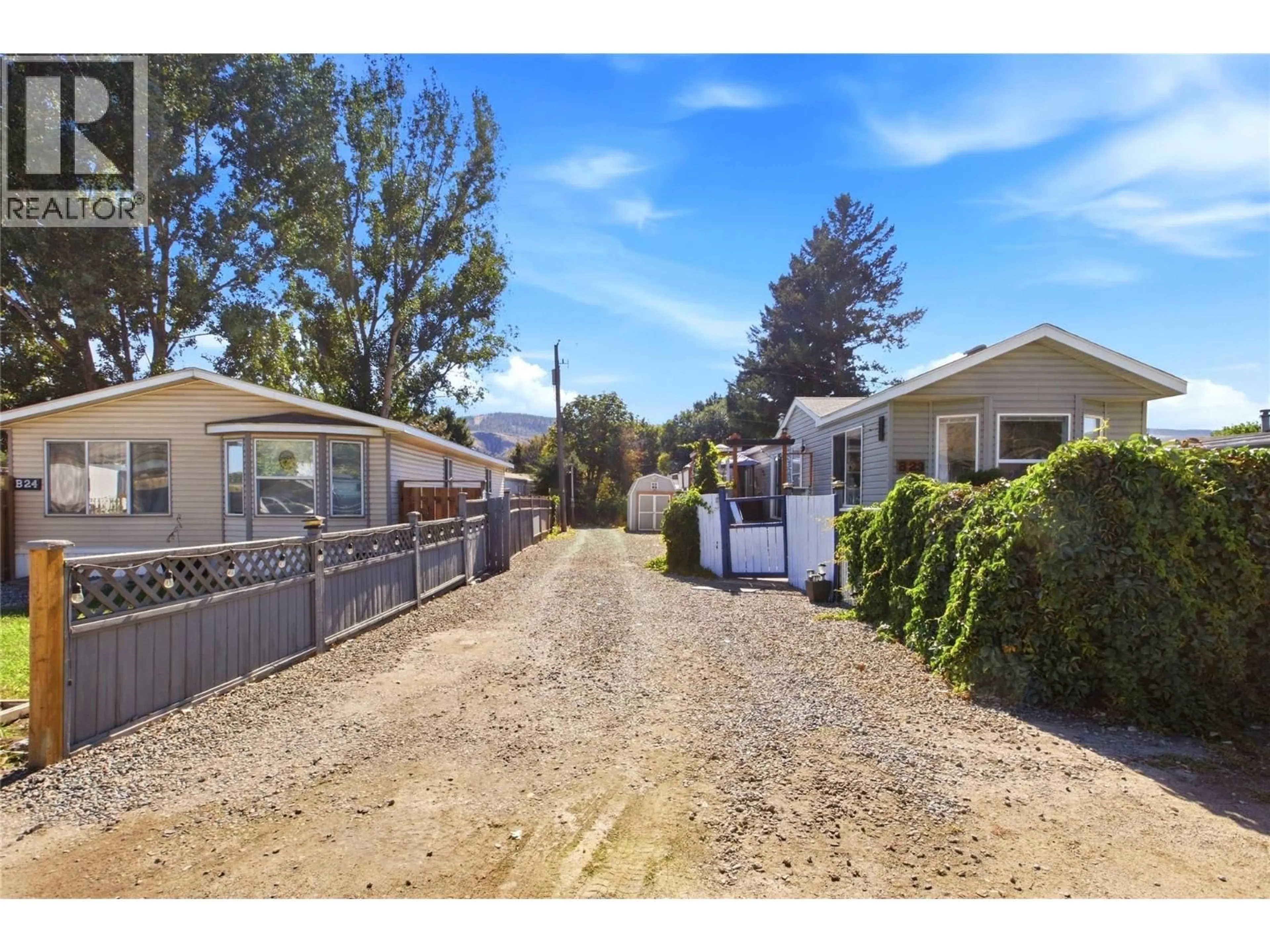 A pic from outside/outdoor area/front of a property/back of a property/a pic from drone, street for B23 - 220 G&M ROAD, Kamloops British Columbia V2H1A4