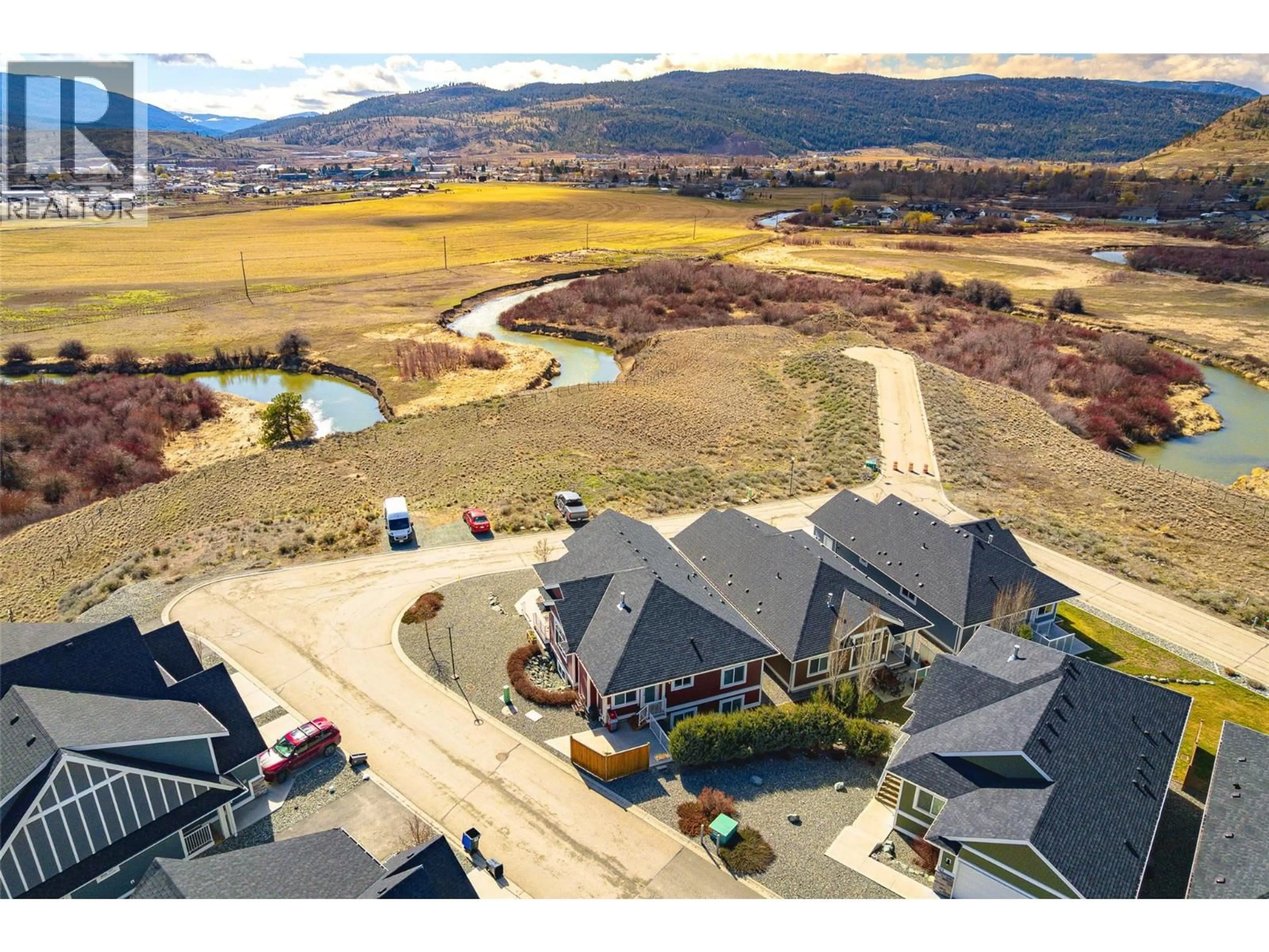 A pic from outside/outdoor area/front of a property/back of a property/a pic from drone, water/lake/river/ocean view for 106 - 2514 SPRING BANK AVENUE, Merritt British Columbia V1K0B1
