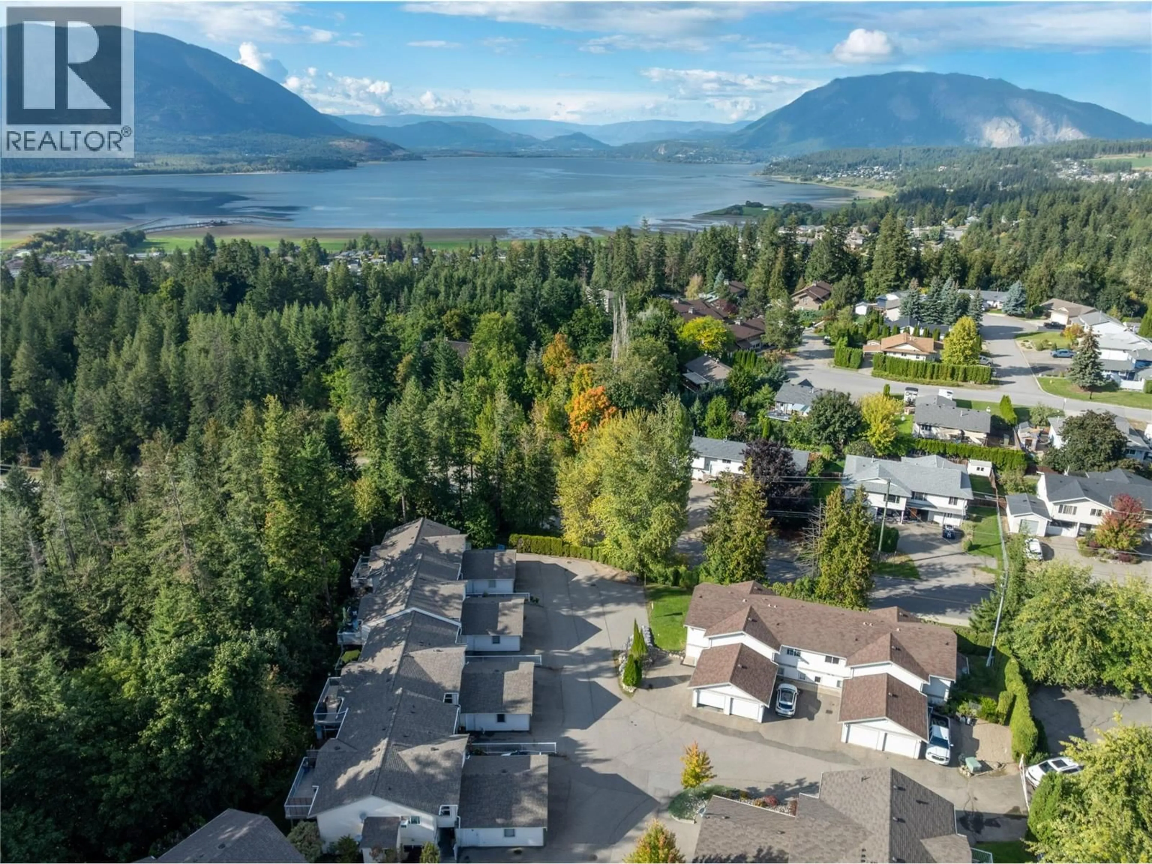 A pic from outside/outdoor area/front of a property/back of a property/a pic from drone, mountain view for 32 - 171 17 STREET SOUTHEAST, Salmon Arm British Columbia V1E1P8